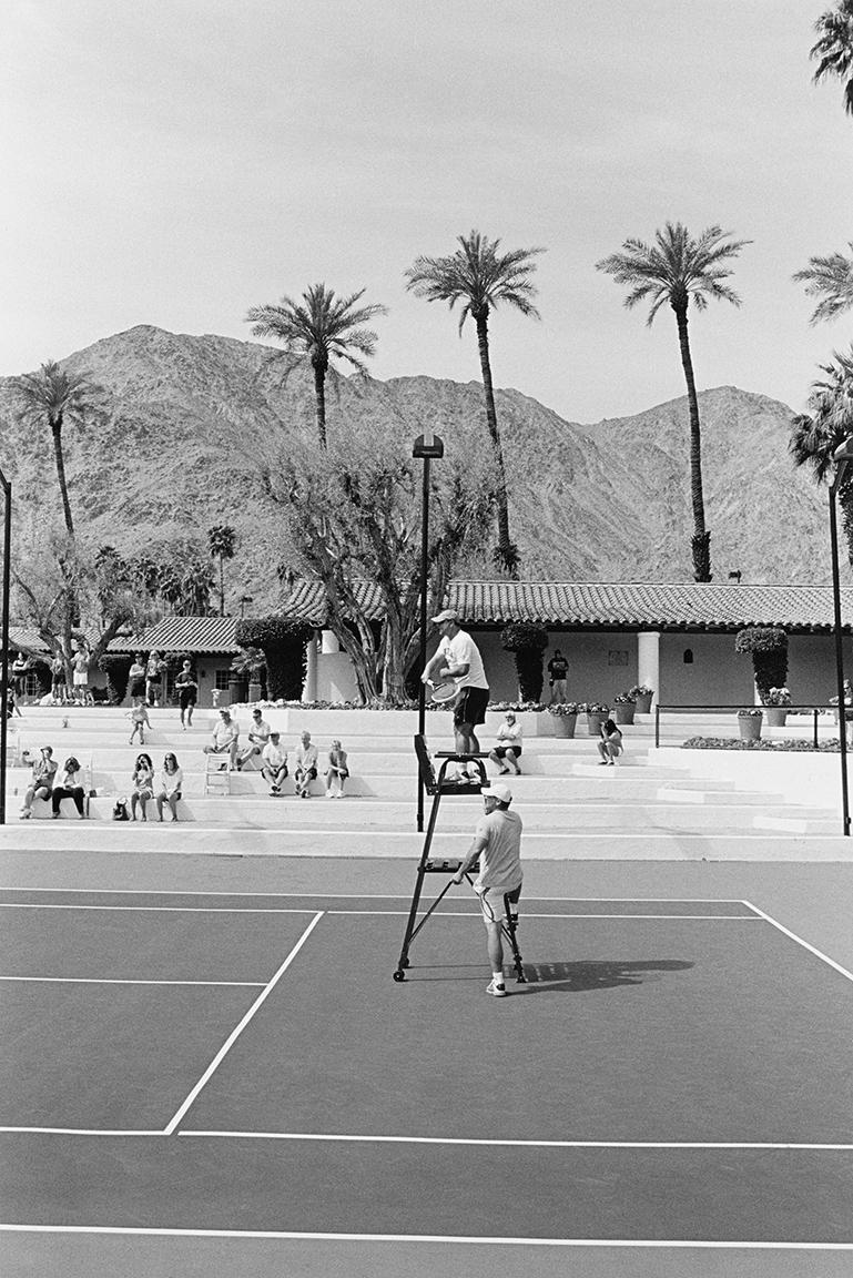 Stephan Würth Black and White Photograph - Marián serving to Novak ahead of John Isner match, La Quinta, California