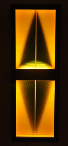 Yellow Alcove - Illuminated, symmetrical, geometric forms in amber yellow