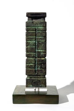 Dynest - Totemic sculpture with patinated browns and greens