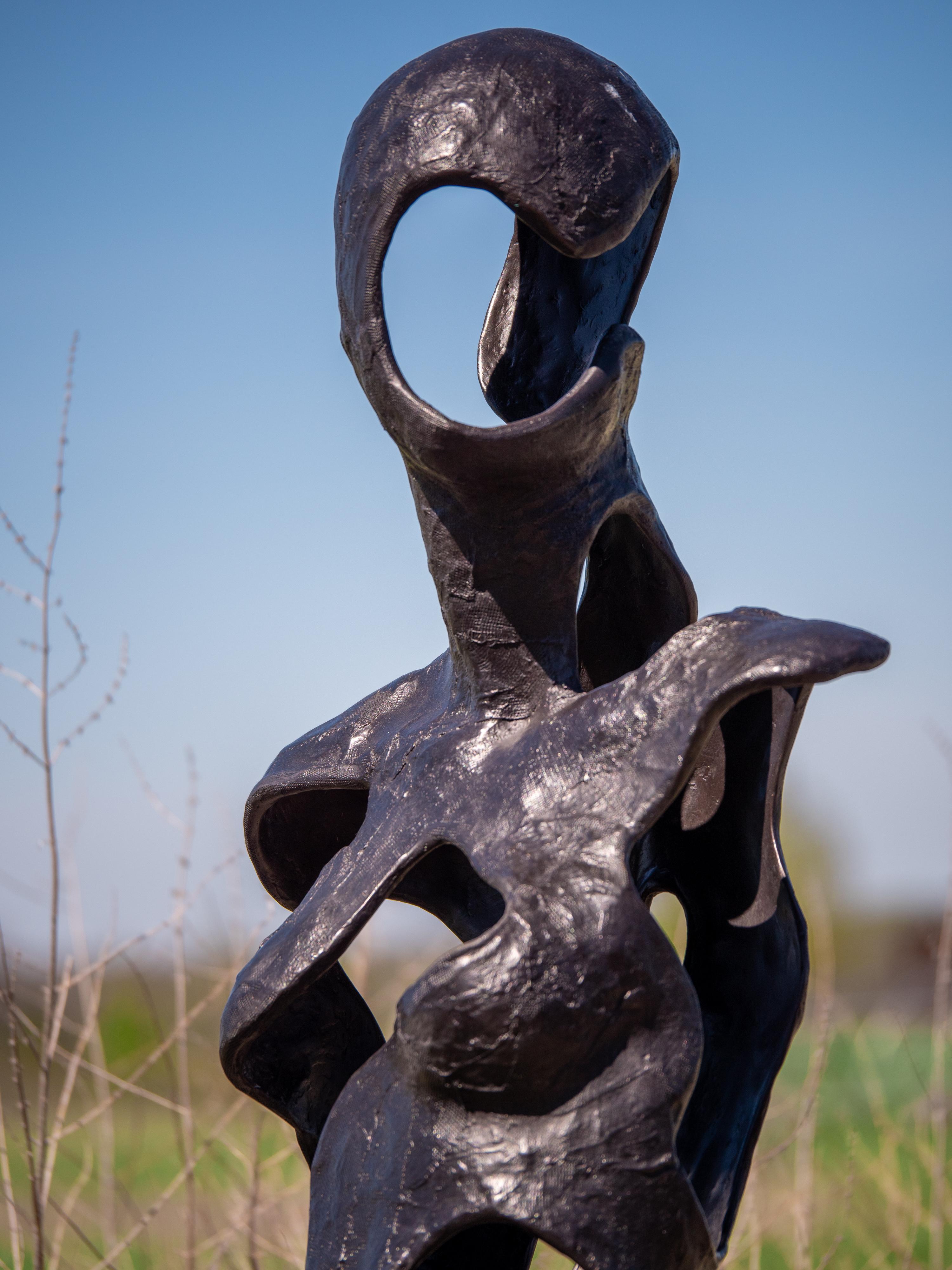 V_N_S Edition 3/9 - tall, abstracted, figurative female bronze outdoor sculpture 1