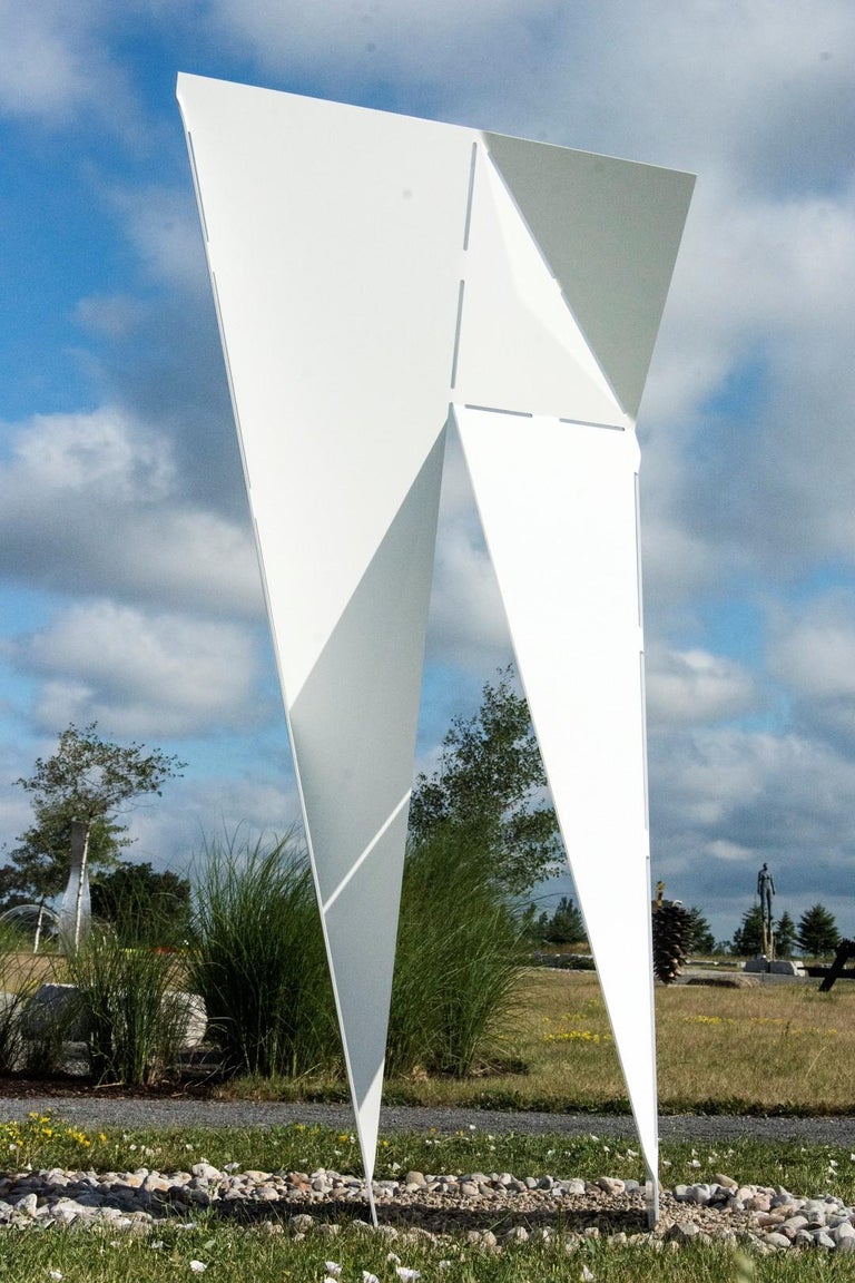 Angled sheets of steel in cloud white, like folded and perforated paper, cast elegant shadows in this minimalist inspired sculpture by Rocco Turino.  Edition AP / 5.

Originally from Italy, and moving to Canada as a child, Rocco Turino was drawn