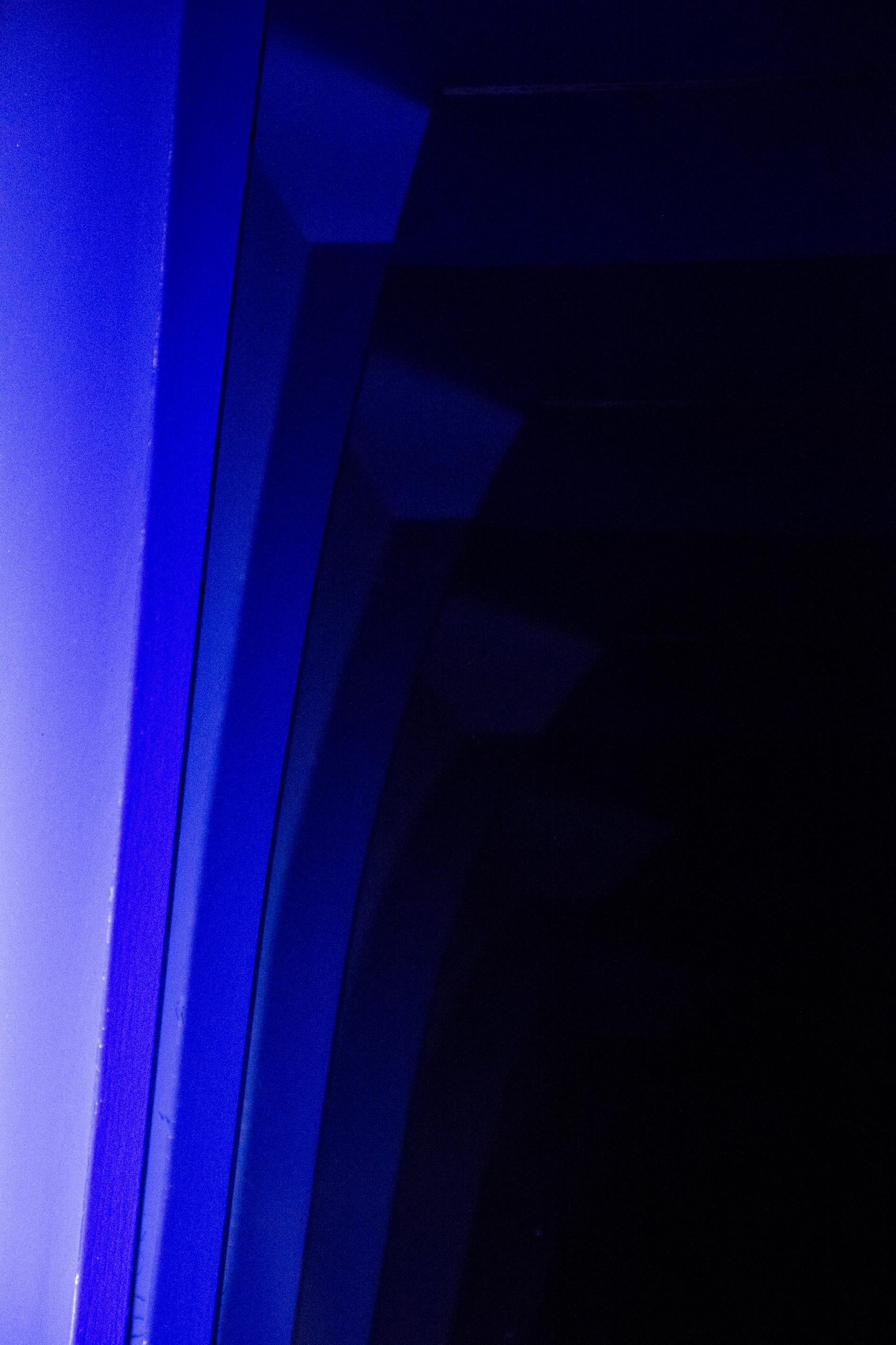 Bent Blue - glowing, illuminated, symmetrical, geometric forms in electric blue 3
