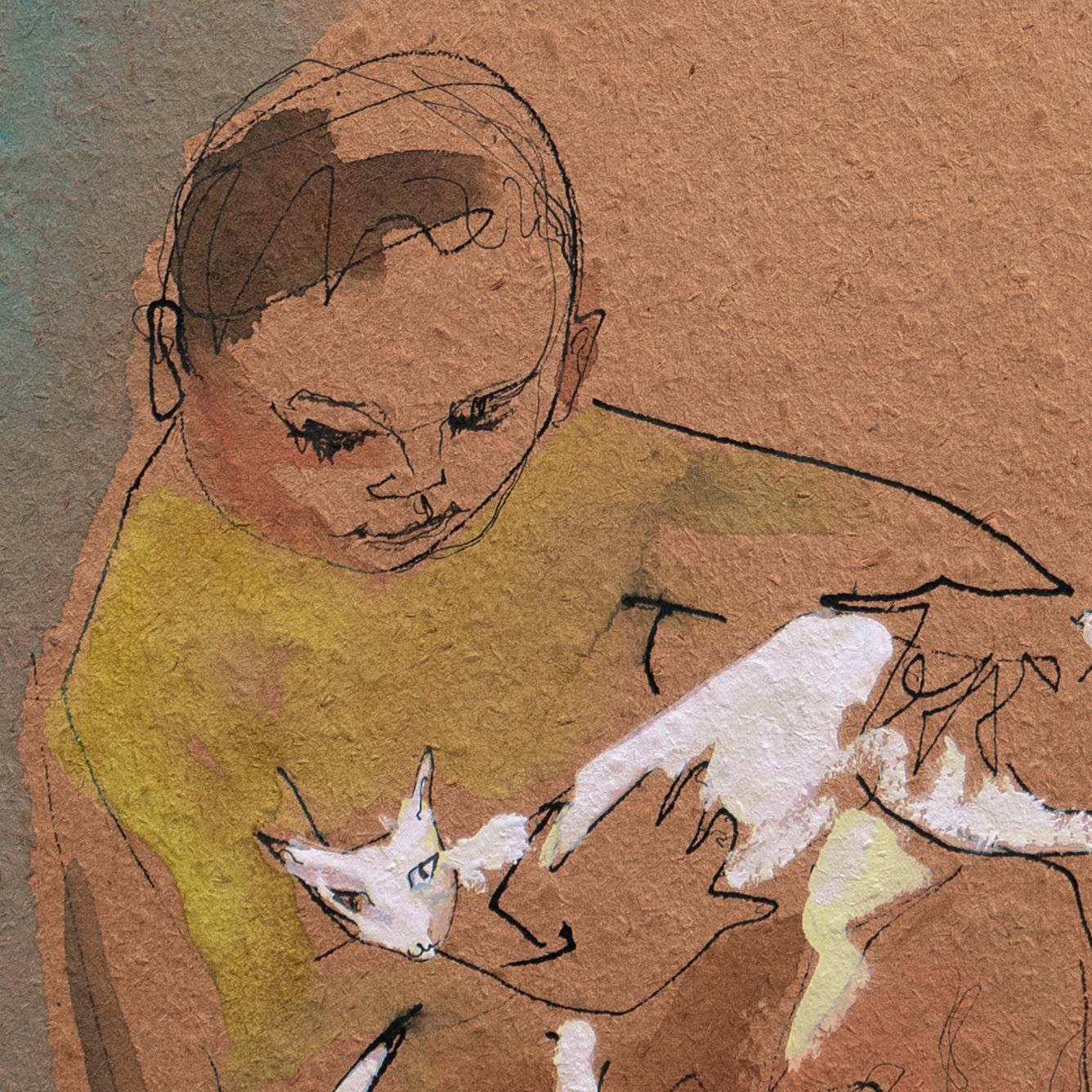 Niño con gato blanco