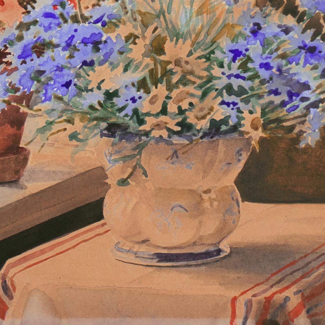 Flores en el alféizar de una ventana