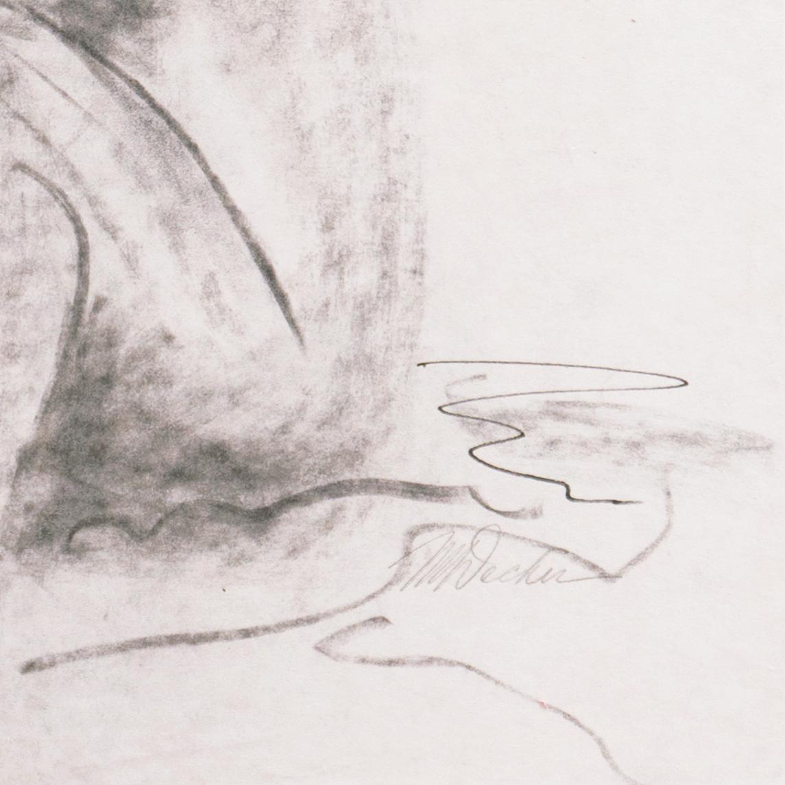 Desnudo sentado
