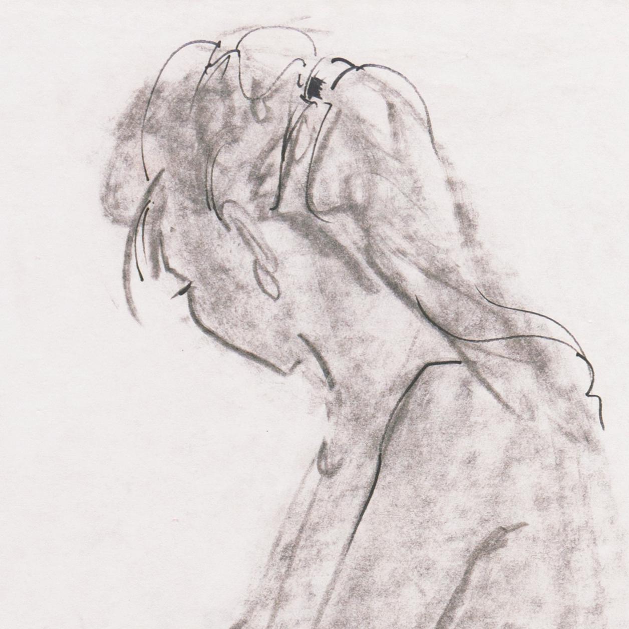 Desnudo sentado