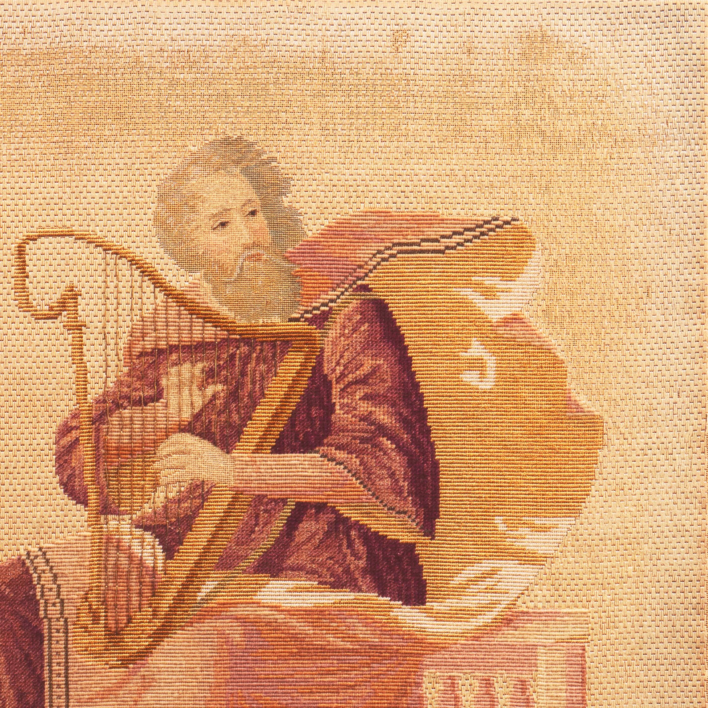 A substantial mid-nineteenth century figural embroidery showing the bard with a full beard playing a lyre, seated on a classical colonnade and gazing sightlessly to his right. Created circa 1860.