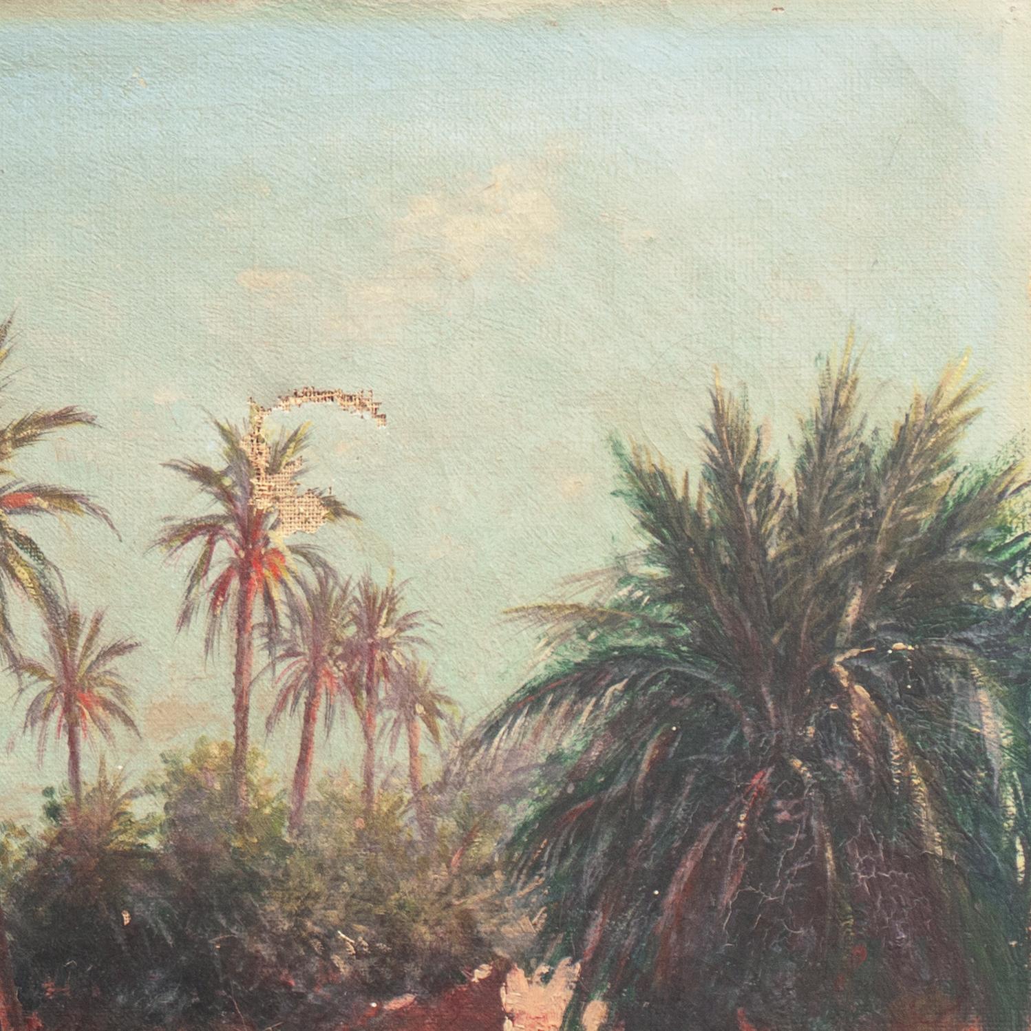 A finely painted, late 19th century, French School oil showing a view of travelers and camels resting by a waterhole beneath towering date palms in a Tunisian landscape. Unsigned and painted circa 1880.
Bearing old label, verso, reading 'Droguerie