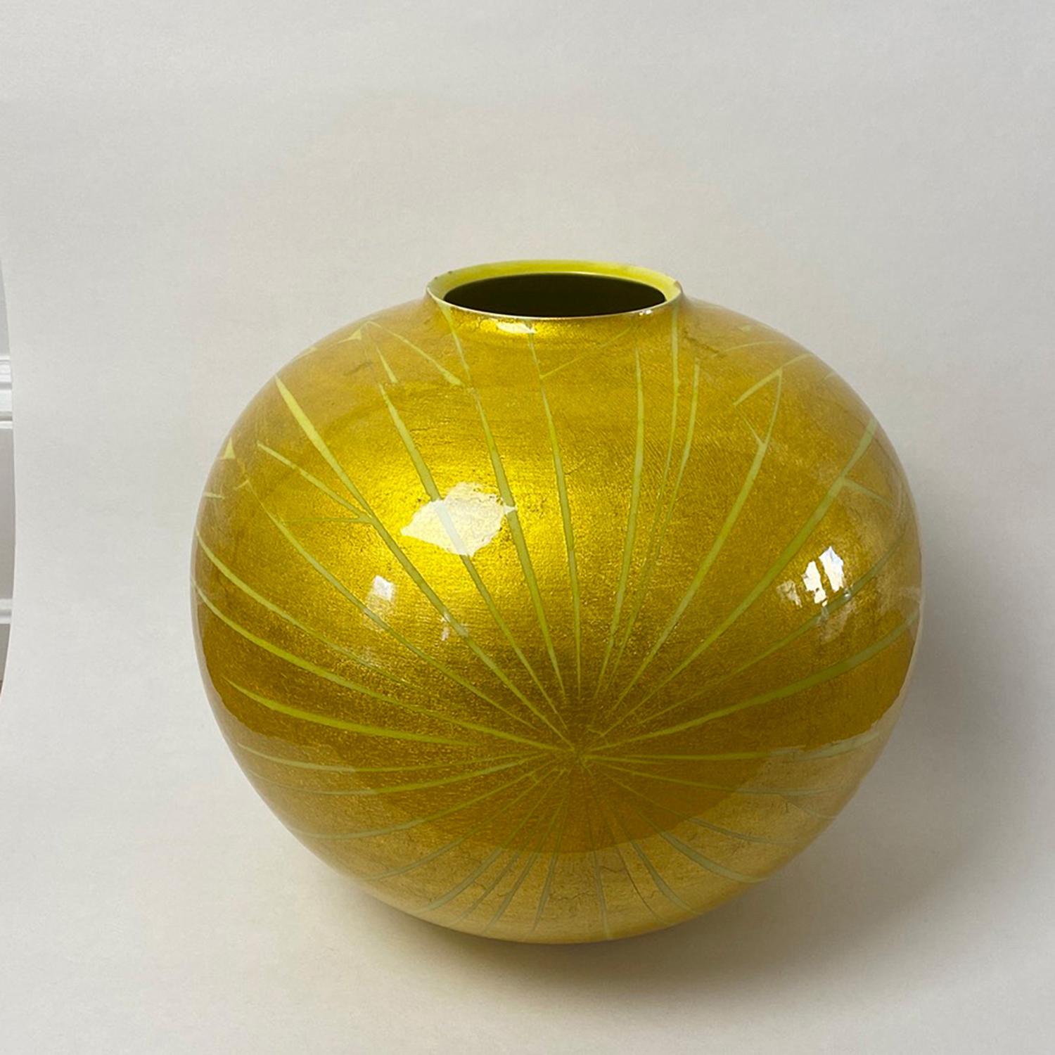 ONO HAKUKO (1915-1996)
Yellow Globular Vessel
Porcelain, gold leaf
11.5 x 11 inches
With artist signed tomobako

From Aichi prefecture, Ono Hakuko (1915-1996) as trained by her father initially in the ceramic arts. However she was most strongly