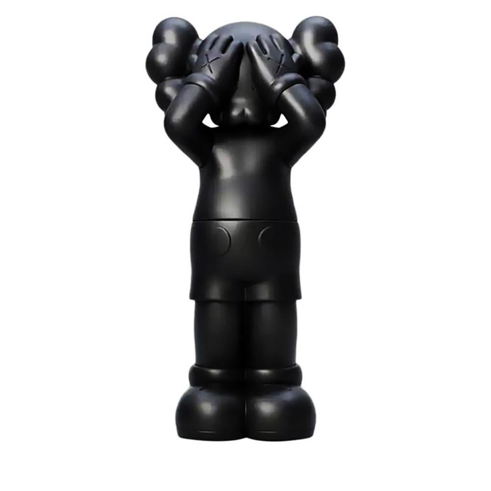 esculturas kaws