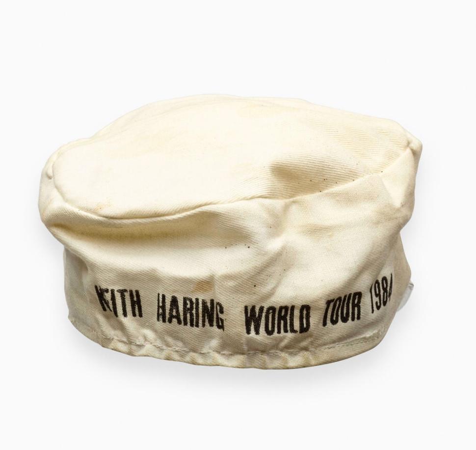 1983 Keith Haring Dancing Figures drawing on Keith Haring World Tour hat:

A rare, historic Keith Haring collectible featuring a sharply executed black marker drawing of Haring’s signature dancing figures combined with a bold, crisp Haring signature