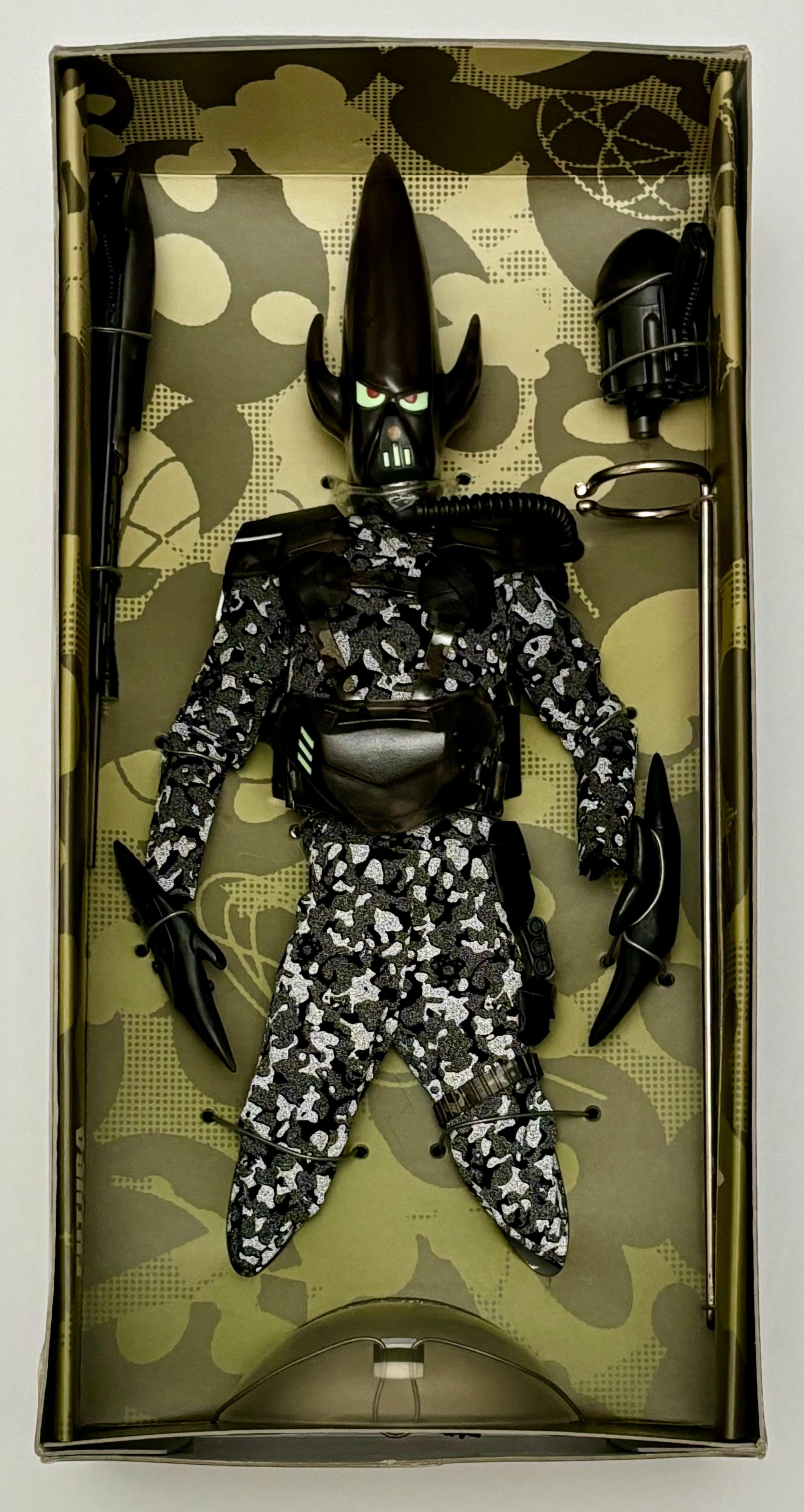Signed FUTURA UNKLE Art Toy 2004 (Futura Pointman):

This rare, hand-signed vintage limited edition, Futura UNKLE 77 art toy, was designed by the New York graffiti legend circa 2004 & features Futura’s Pointman in space combat gear. The work