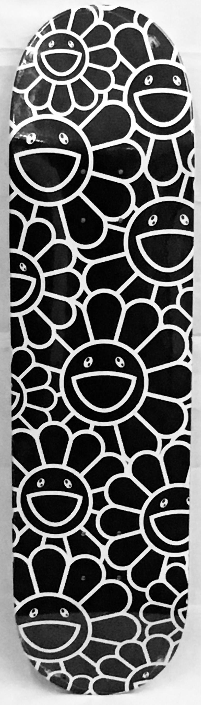 Murakami Flowers Skate Deck (Black and White)
A vibrant piece of Takashi Murakami wall art produced as a limited series in conjunction with the 2017 Murakami exhibit: The Octopus Eats Its Own Leg, MCA Chicago. This deck is new in its original