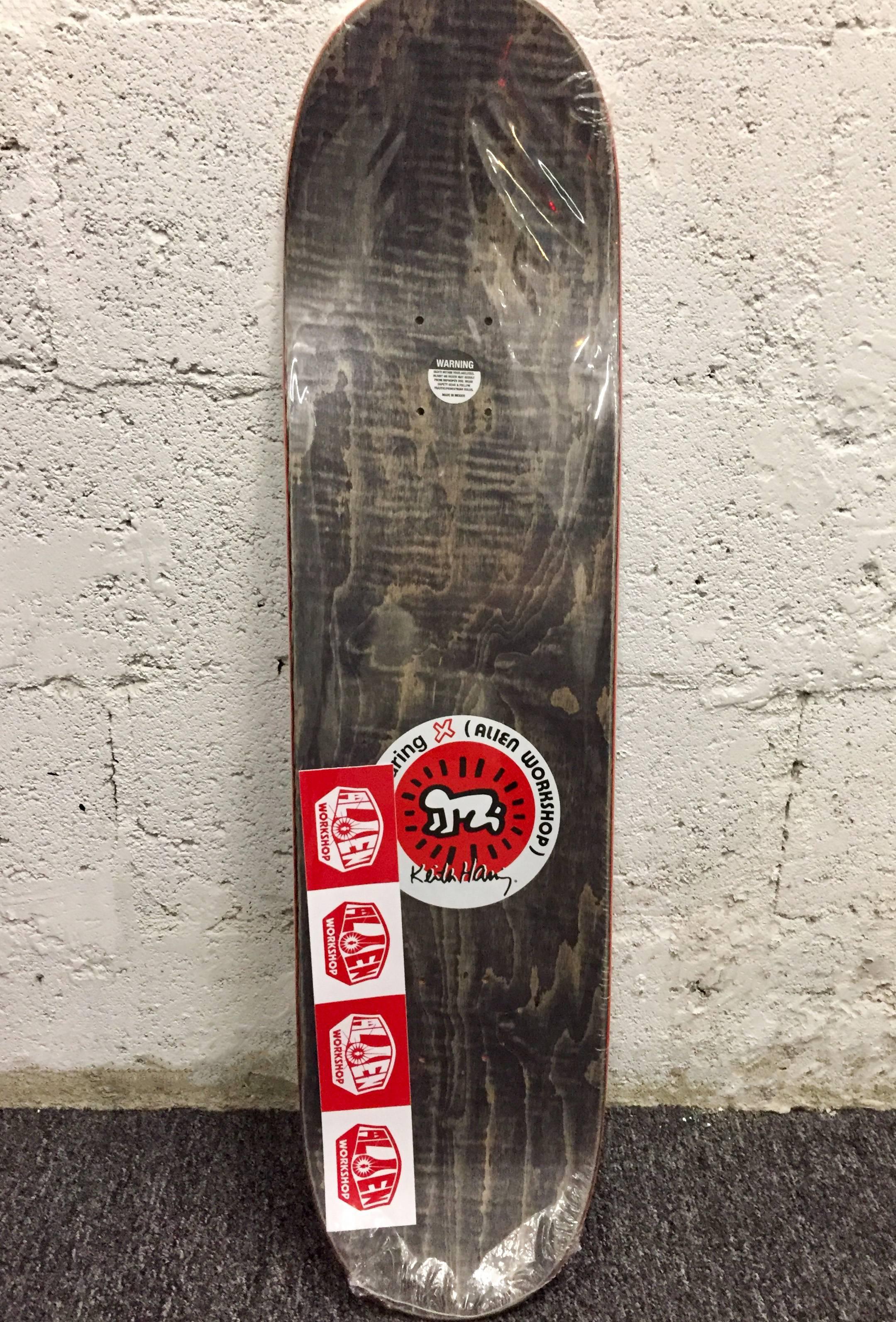 Rare Out of Print 2012 Keith Haring Skate Deck featuring classic Haring iconography.

This work originated circa 2012 as a result of the collaboration between Alien Workshop and the Keith Haring Foundation. The deck is new and in its original