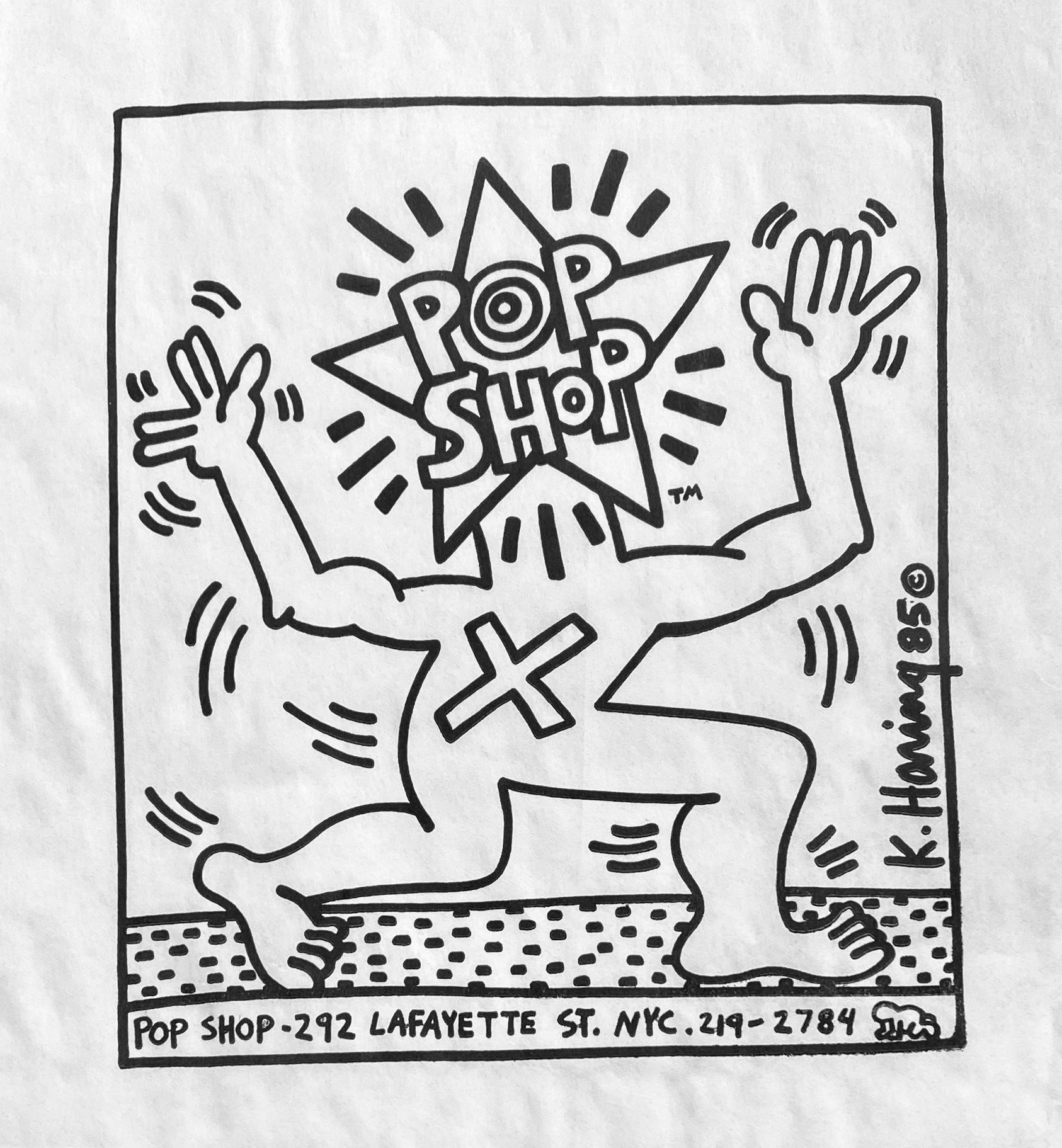 Vintage Keith Haring 1980s Pop Shop bag off-set illustrated by Haring. A classic Keith Haring Pop Shop collectible that is well-suited for framing. 

Medium: Offset lithograph on whiter paper bag. c.1986.Approximately 8.5 x 11 inches. 

Good to very