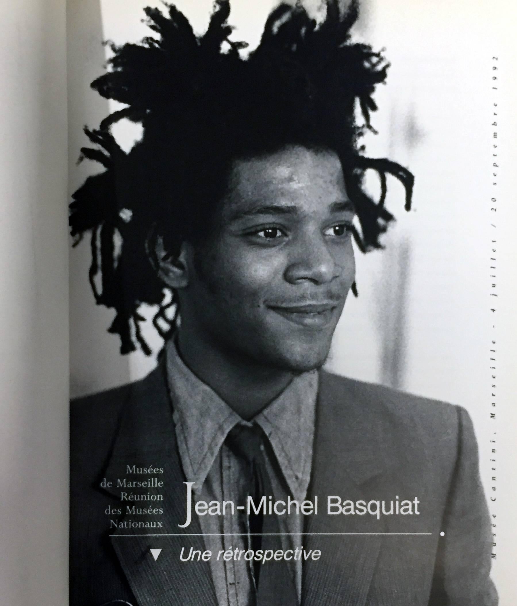 Original Exhibition Catalog, for Jean-Michel Basquiat – A Retrospective; Musée Cantini, Marseille, France, 1992

Illustrated cover with flaps, 192 pages; approx 10 x 12 inches (30 x 23 cm)
Approximately 65 color reproductions plus some rare photos