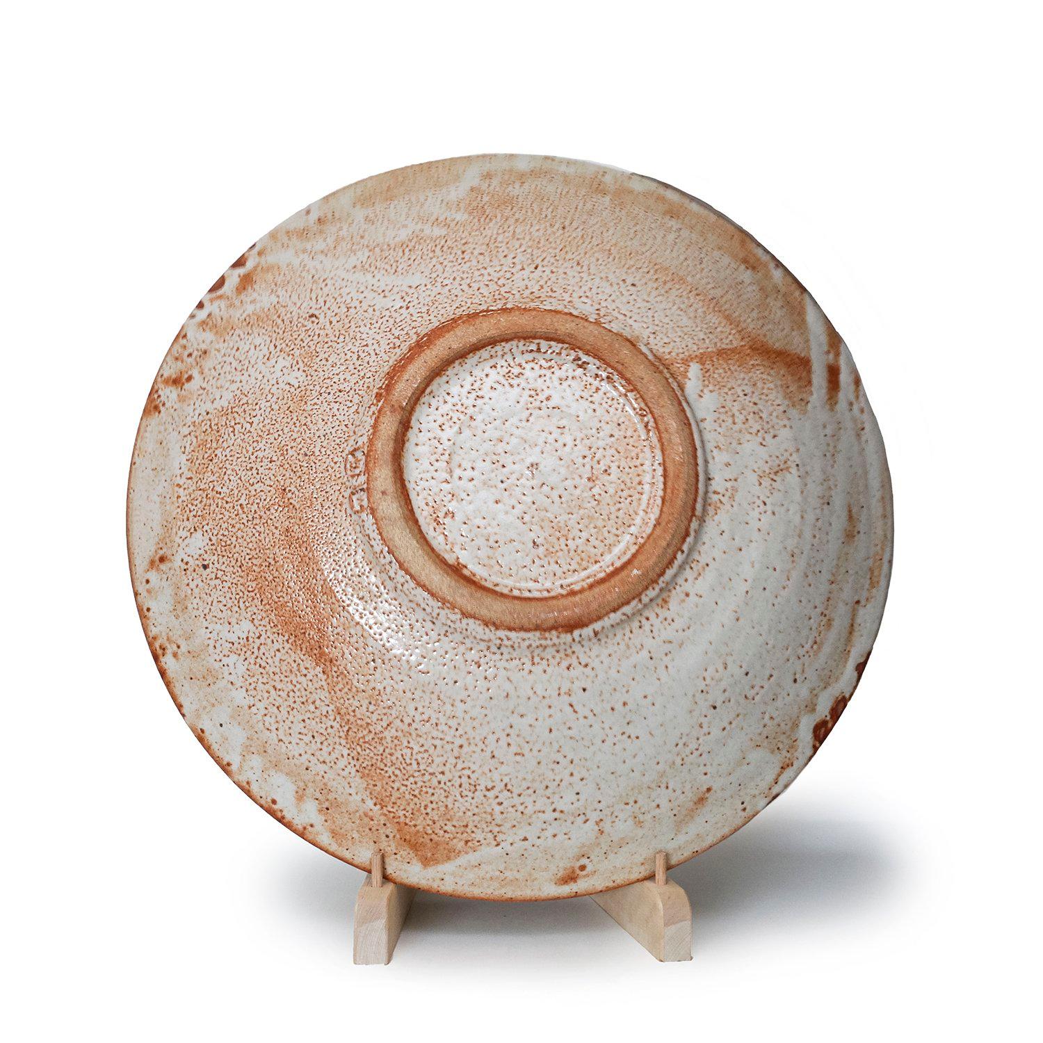 Warren MacKenzie
Platter (INV# NP3284)
stoneware and shino glaze
4.5 x 18.5 x 18.5”
circa 2000
double stamped! Very rare!

Warren MacKenzie (1924 - 2018) is recognized as a true master of 20th Century ceramic art. Through his traditional