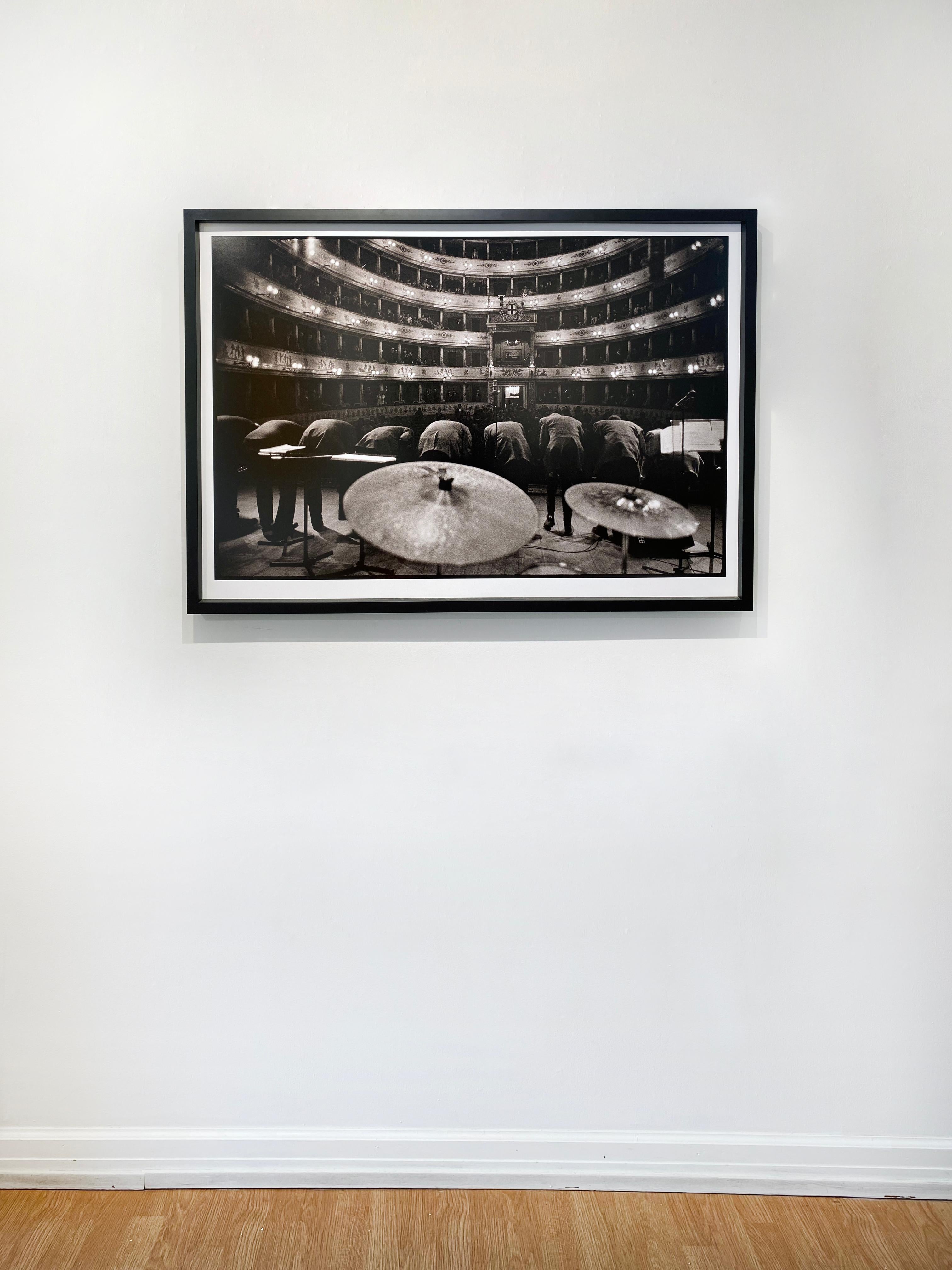 'The Bow' by American photographer Frank Stewart, 1997. Pigment print, 30 x 40 inches. This photograph features the group Jazz at Lincoln Center bowing in unison after a concert in Modena, Italy. Wynton Marsalis is one of the central figures in the