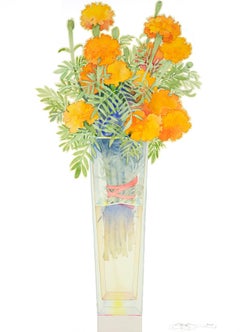 Marigolds in a tall vase