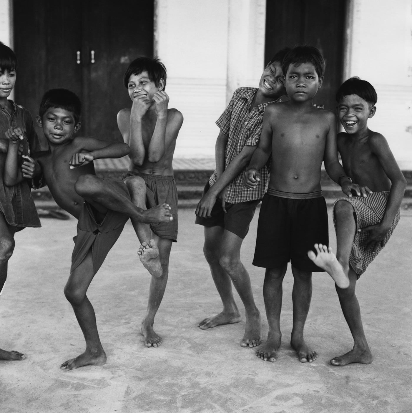 Justin Creedy Smith Black and White Photograph - Cambodia Smiles - Limited Edition - Oversize print