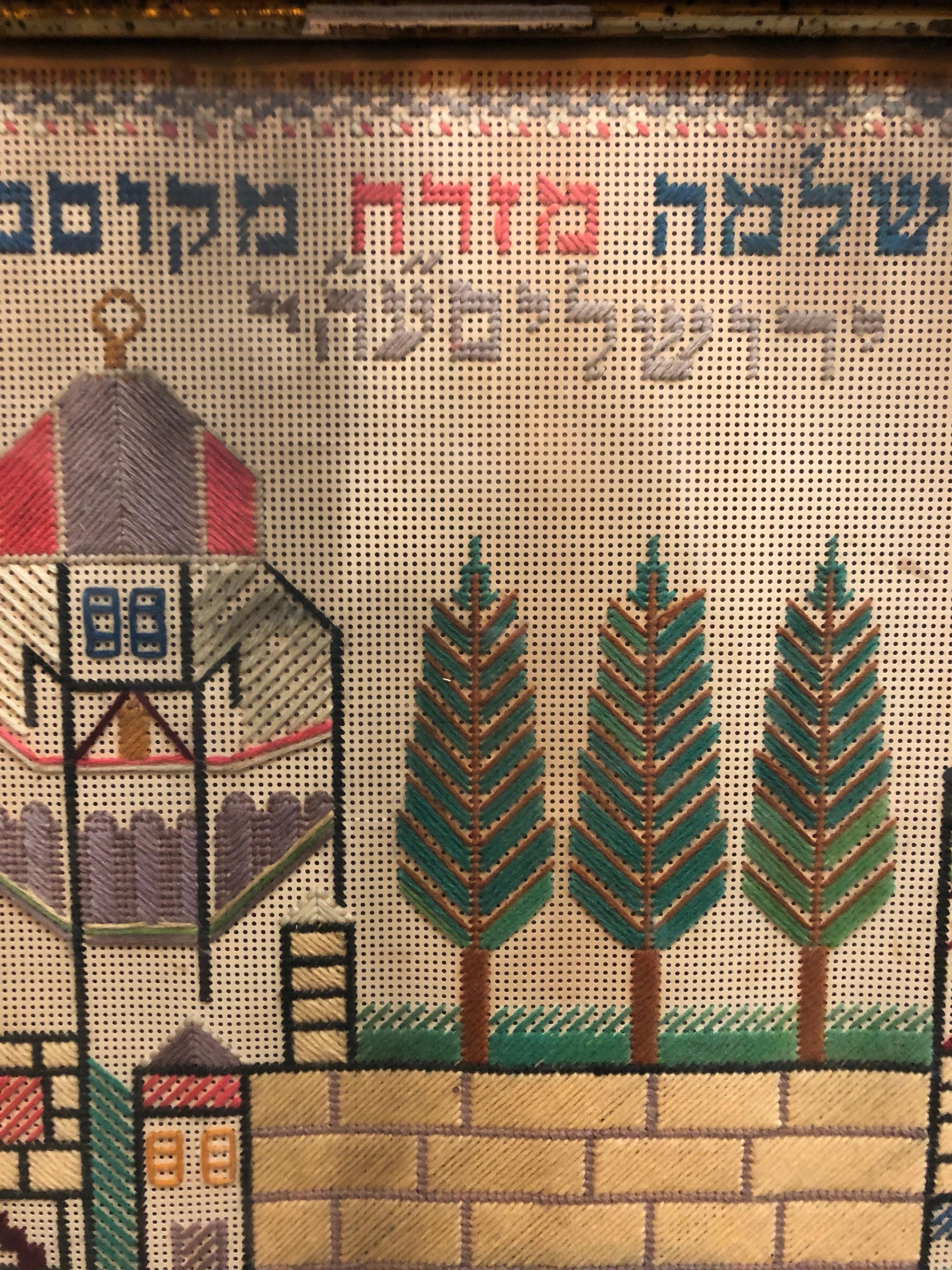 Punch point embroidered Sampler, Midrash Shlomo Jerusalem, 1900/1901. (It is dated with the Jewish Year 5661)

This sort of art, craft work, emerges from a long tradition of Jewish folk art.
Today, many of these artists are professionally trained