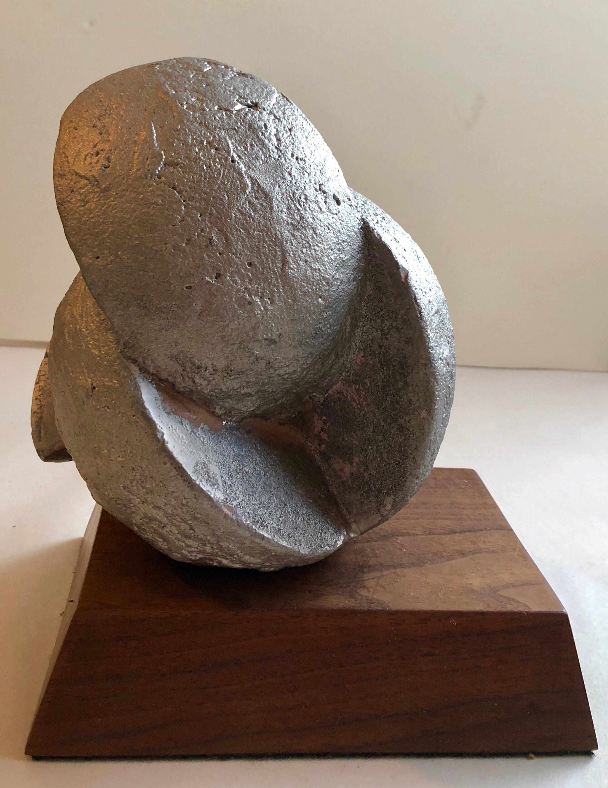 Cubist abstract metal sculpture by the artist David John Barr. This 1990's artwork titled 