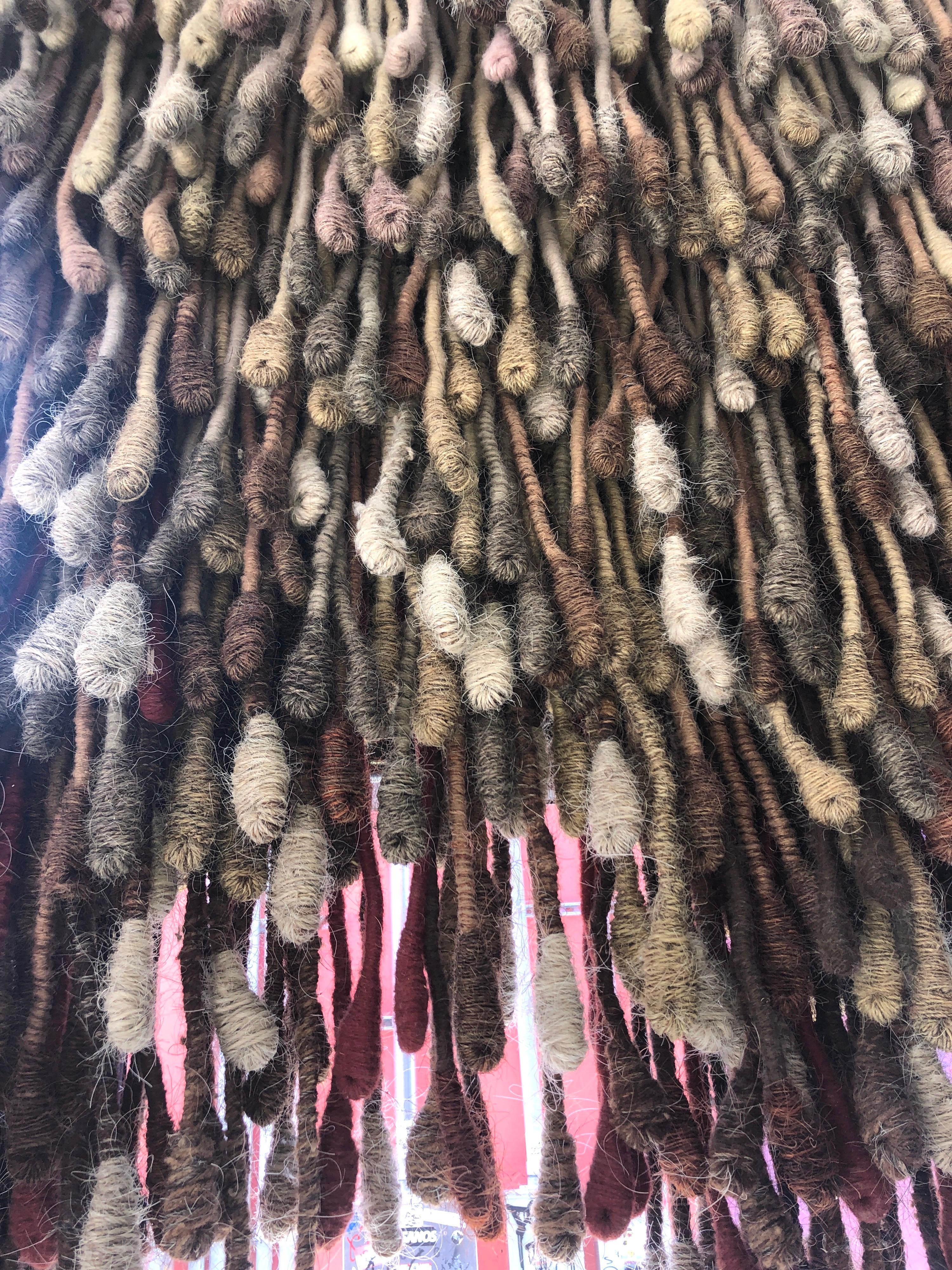 Hand made, hand woven horse hair and wool spectacular textile wall hanging by pioneering Latin American woman artist Marlene Hoffmann. It consists of long hanging pods from a woven back. (this is a sort of tapestry, not the Aubusson or Gobelin type