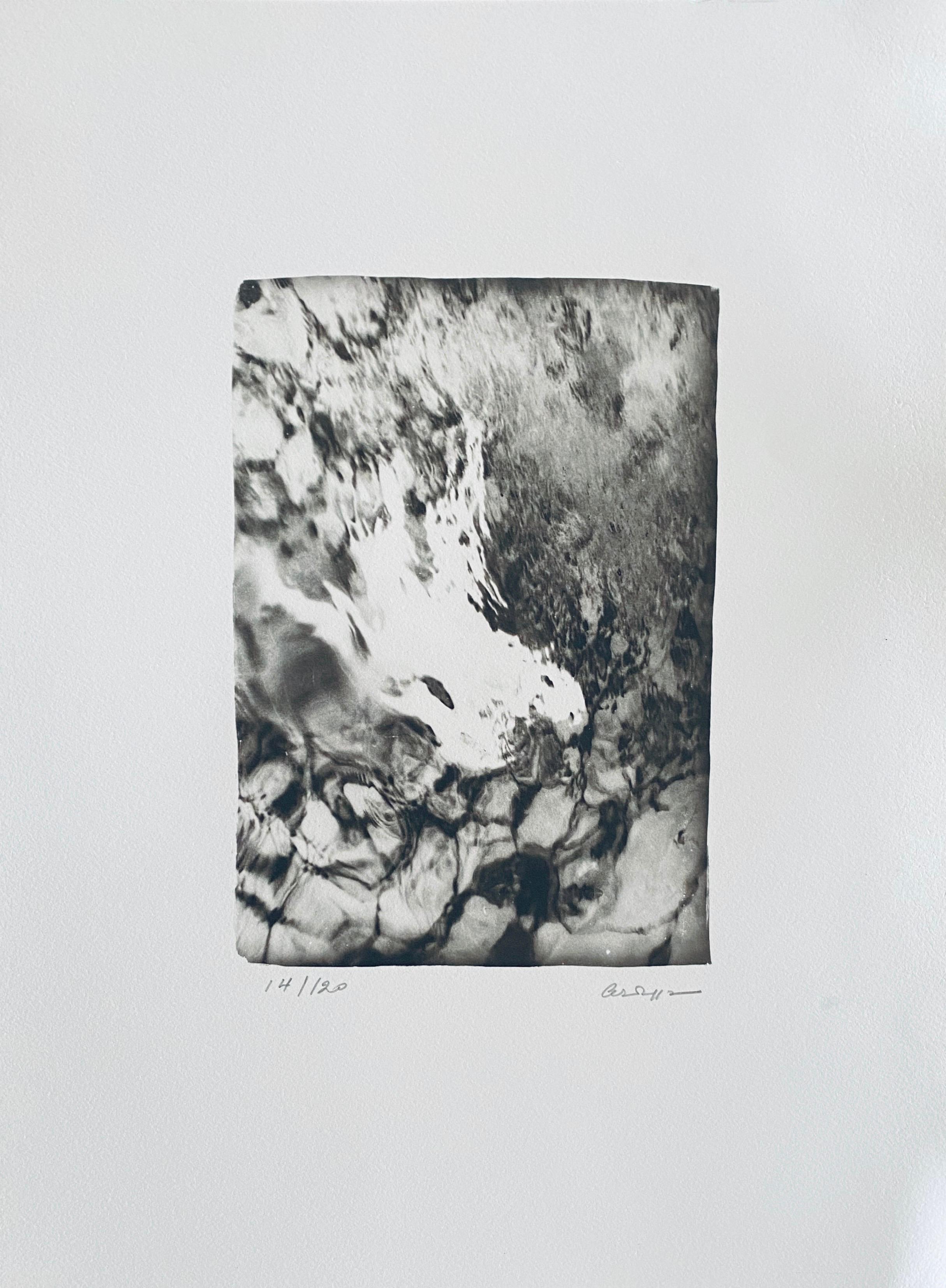 Photos pictured of information cards after the images of the black and white photos are not included. 

La Chute D'Icare (The Fall of Icarus) is a original, black and white photographic image by the French Photographer André Naggar printed in