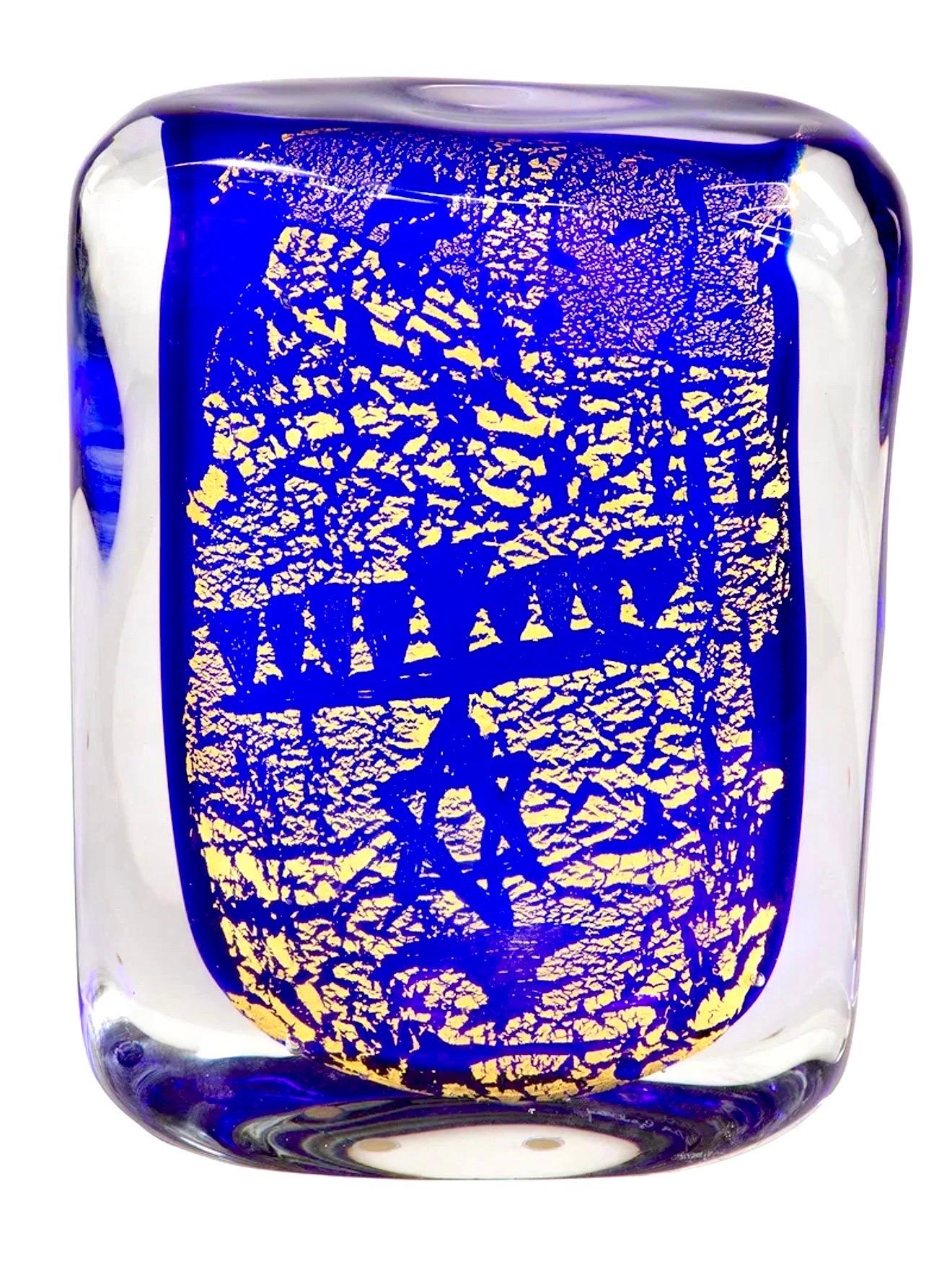 
Giancarlo Signoretto (Italian, 1962-) 
Glass Sculpture  
Undated
Hand signed and dedicated to a gallery on underside.
Depicting a gold menorah and a Jewish star of David over cobalt blue.
Retaining a Made in Murano, Italy sticker on side 