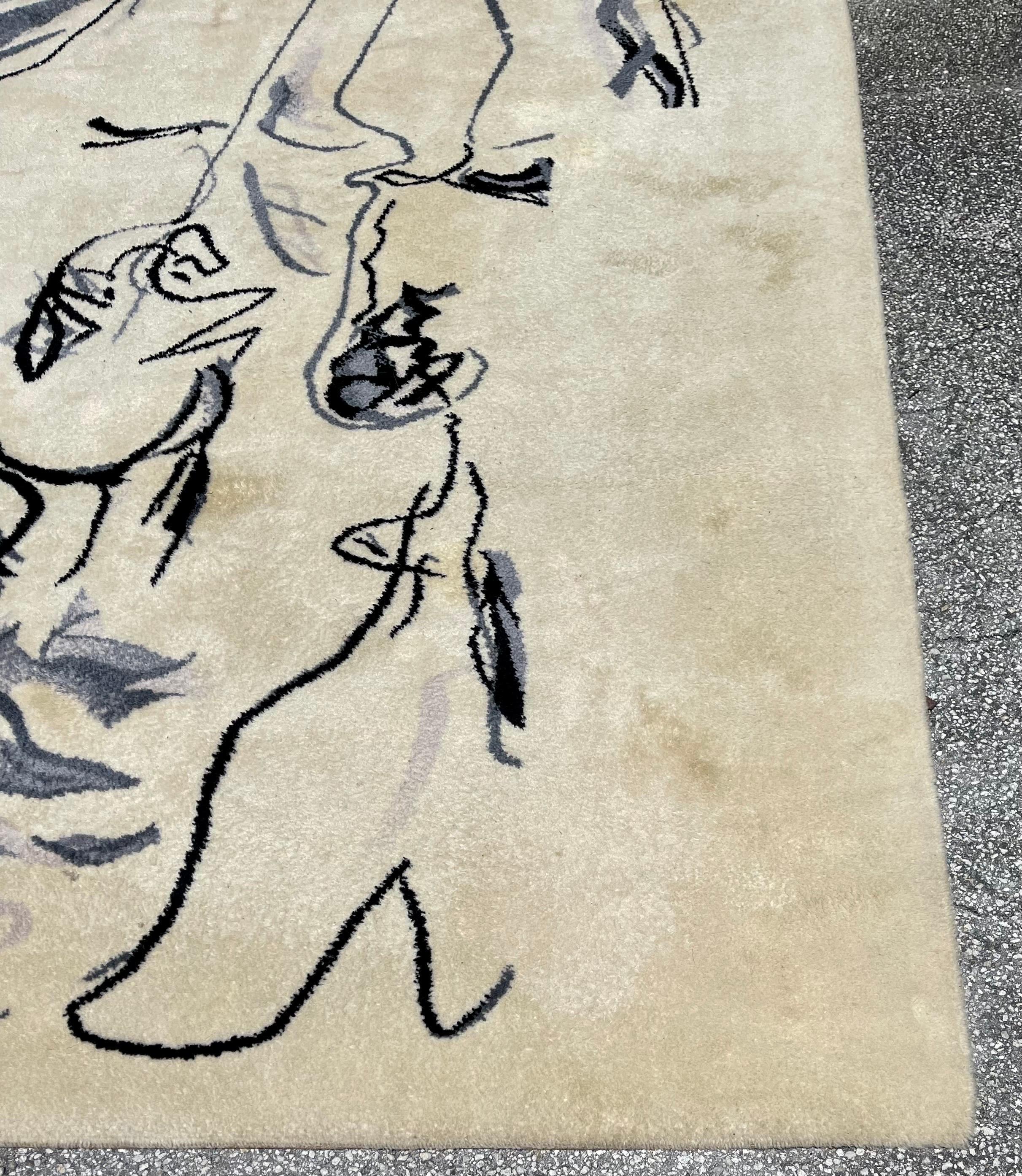 Asger Jorn (1914-1973)
Ege Axminster, Danemark. Tapis de tapisserie danois Art-Line 
Etiquette de l'éditeur Ege Axminster (Danemark) titrée au revers. 
Les Emigrants 
132 x 98 pouces, 
Pure laine vierge en blanc, gris, bleu et noir. 
Signé Jorn dans