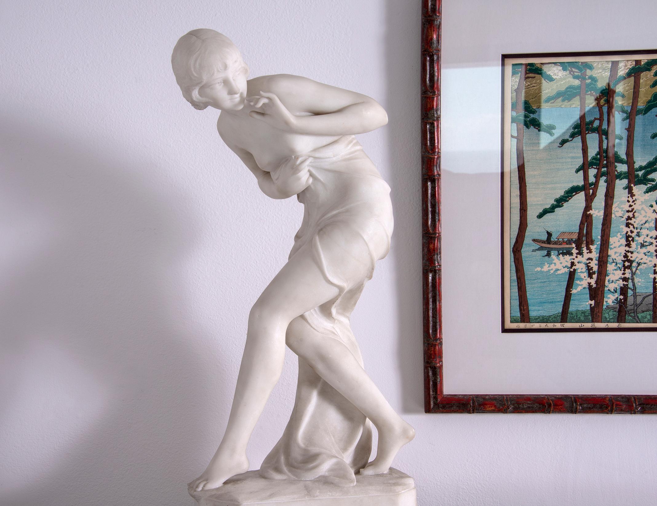 Deftly and elegantly craved marble of a partially drapped Art Deco beauty.   Signed C. Viviani on base.  Stunning!!!
