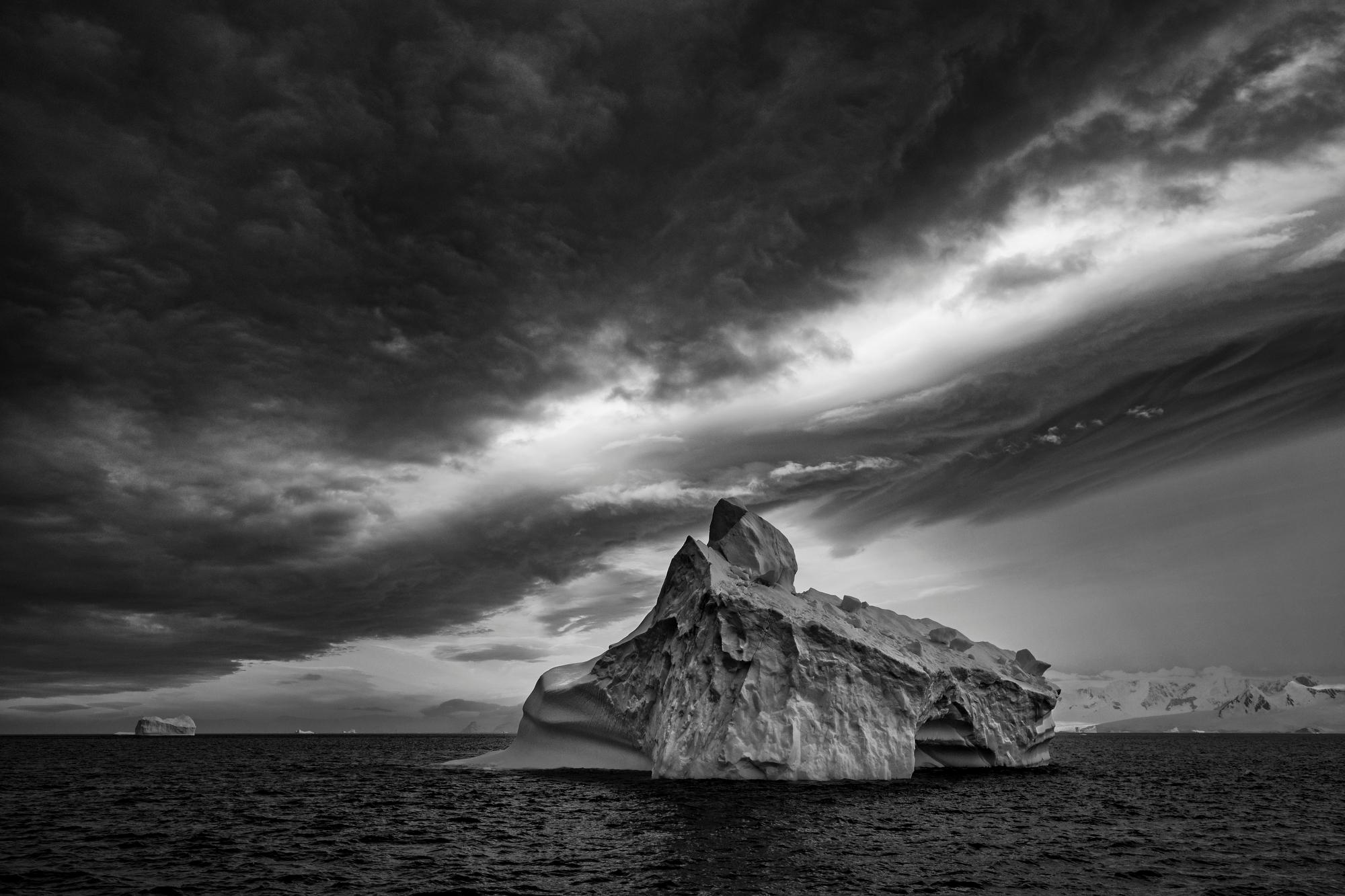 Paul Nicklen Black and White Photograph - Iceberg Alley