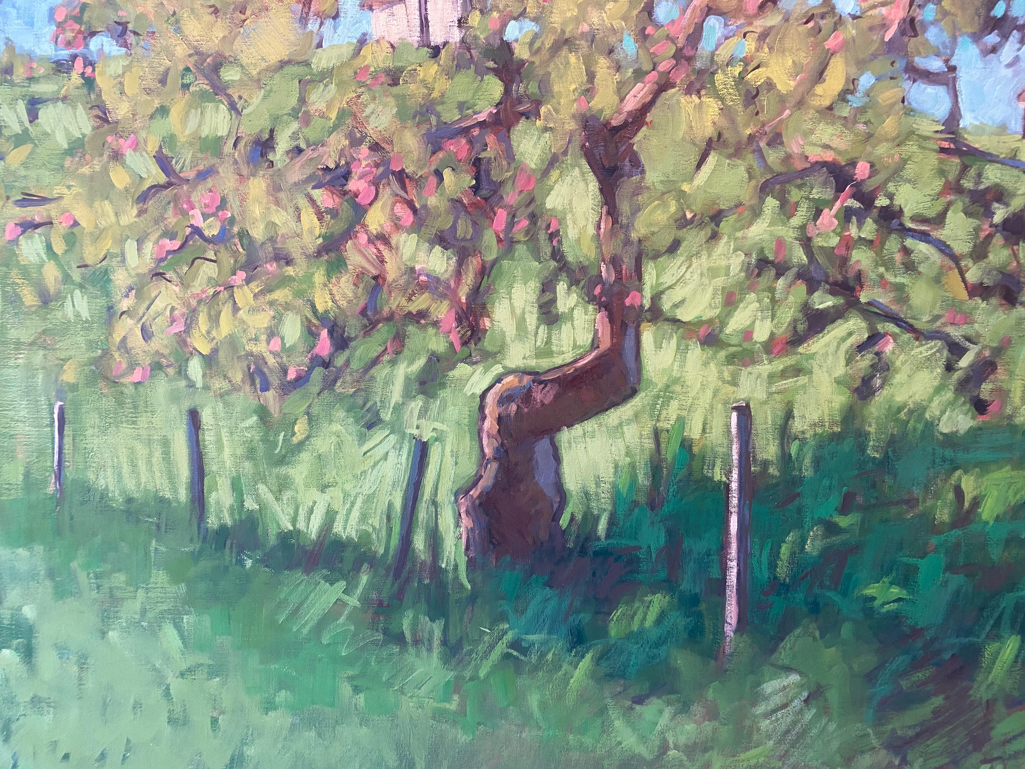 An oil painting of a gangly branched apple tree in a big green field. 

Tim McGuire Born in 1971, Tim McGuire grew up in Buffalo, NY.  After teaching kindergarten in Los Angeles for 10 years, McGuire moved to Florence, Italy where he studied