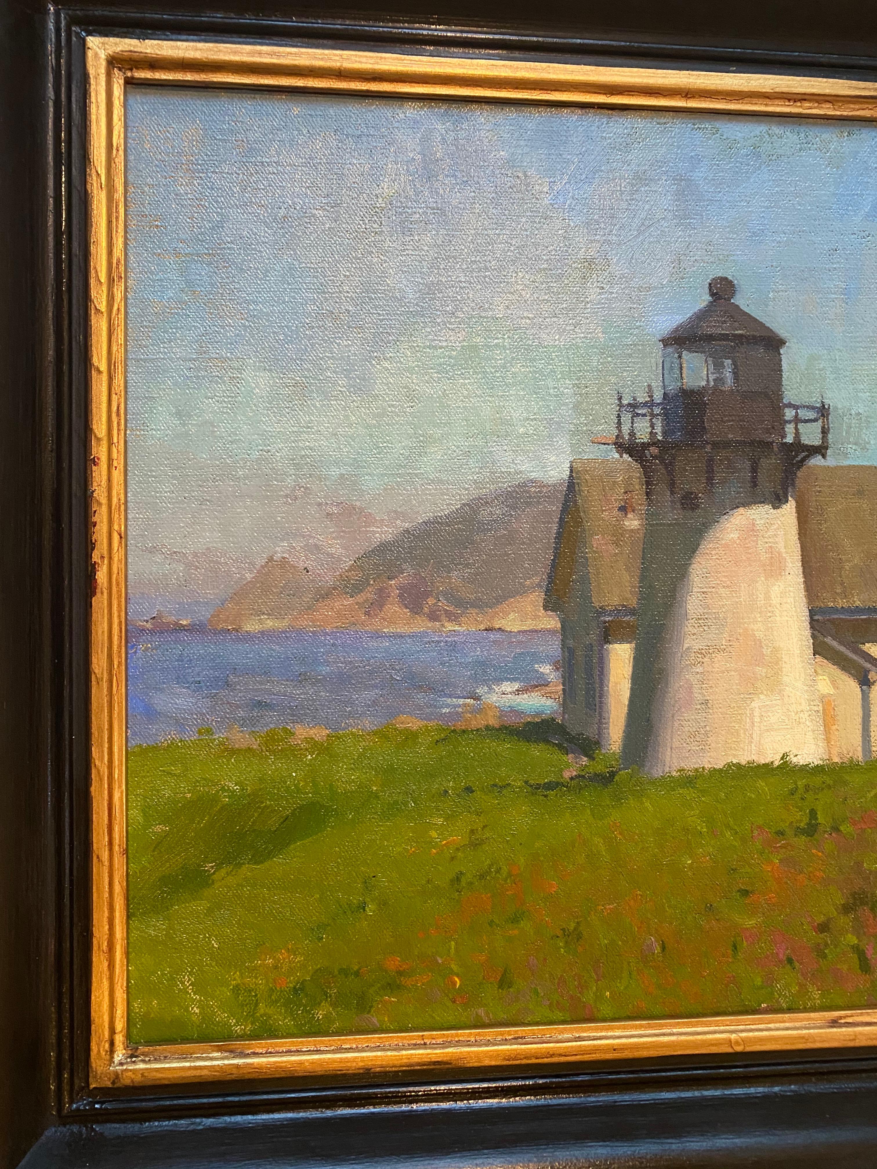 An oil painting of a light house in mid day in California. 

Signed 