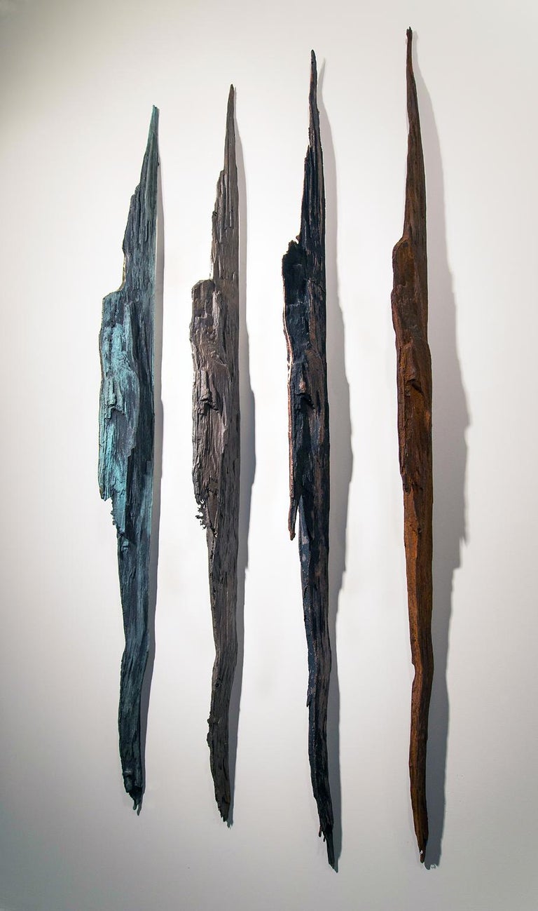"Wall Strikes" by John Ruppert
Cast bronze, Stainless Steel, Copper, Iron, from a fragment of a tree struck by lightning
Edition of 3

Over the past 35 years, John Ruppert has been working in cast metals; manufactured materials such as chain-link