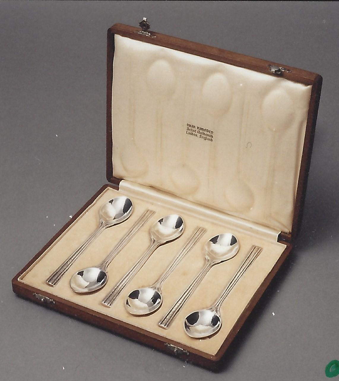 Set of six tea spoons by Omar Ramsden London circa 1931
length of spoon 12.1cm/diameter 2.70 cm
162.6 grams 
