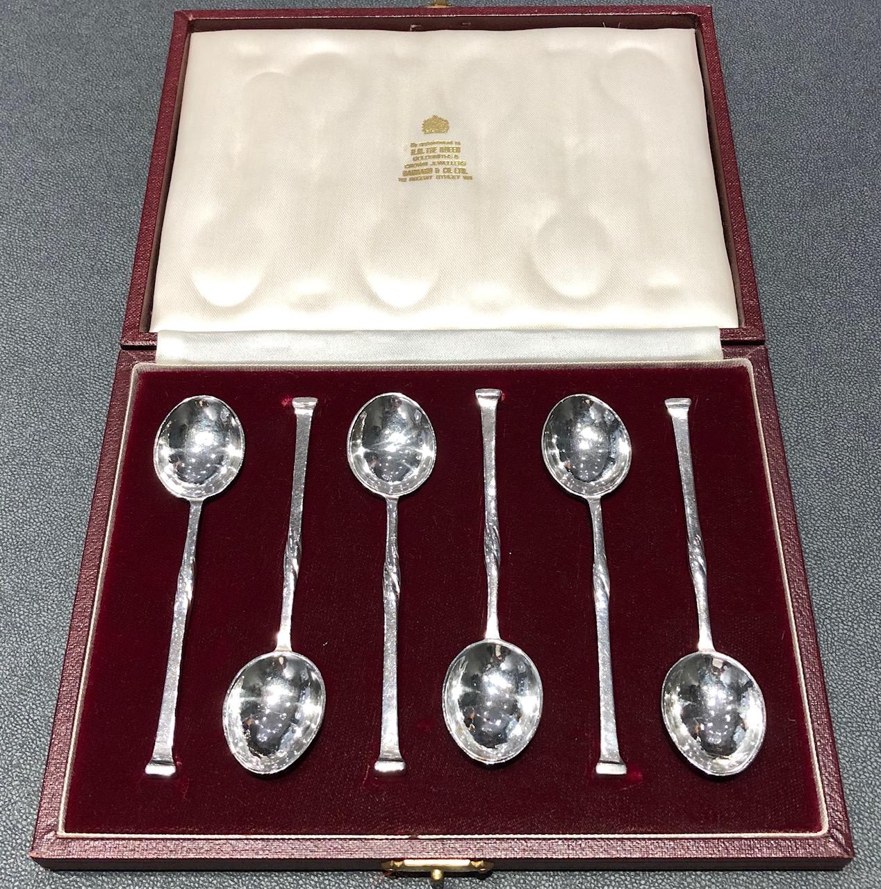 Six silver Coffee spoons by Omar Ramsden  circa 1933
length of spoon 10.2 cm / 2.5cm diameter
96.5 grams