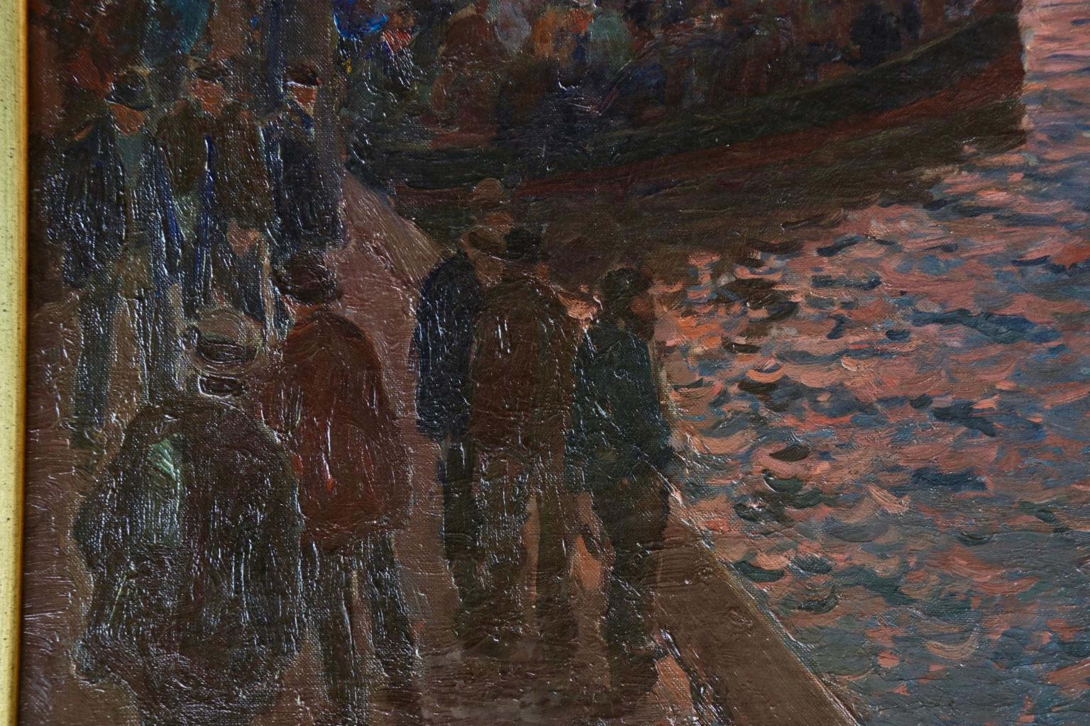 A wonderful oil on canvas circa 1910 by German impressionist painter Friedrich Kallmorgen. The piece depicts a bustling night scene of people waiting to board a ferry at a port on the river in Hamburg, with many other boats sailing by. Signed lower