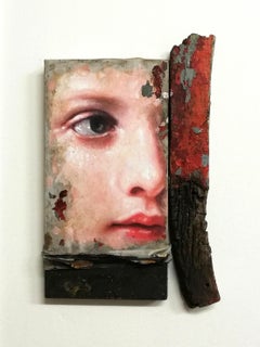 Portrait of young woman on driftwood: 'POLENA'