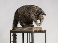 Anteater sculpture on high platform with tin cans: 'A Grim Fairy Tale'
