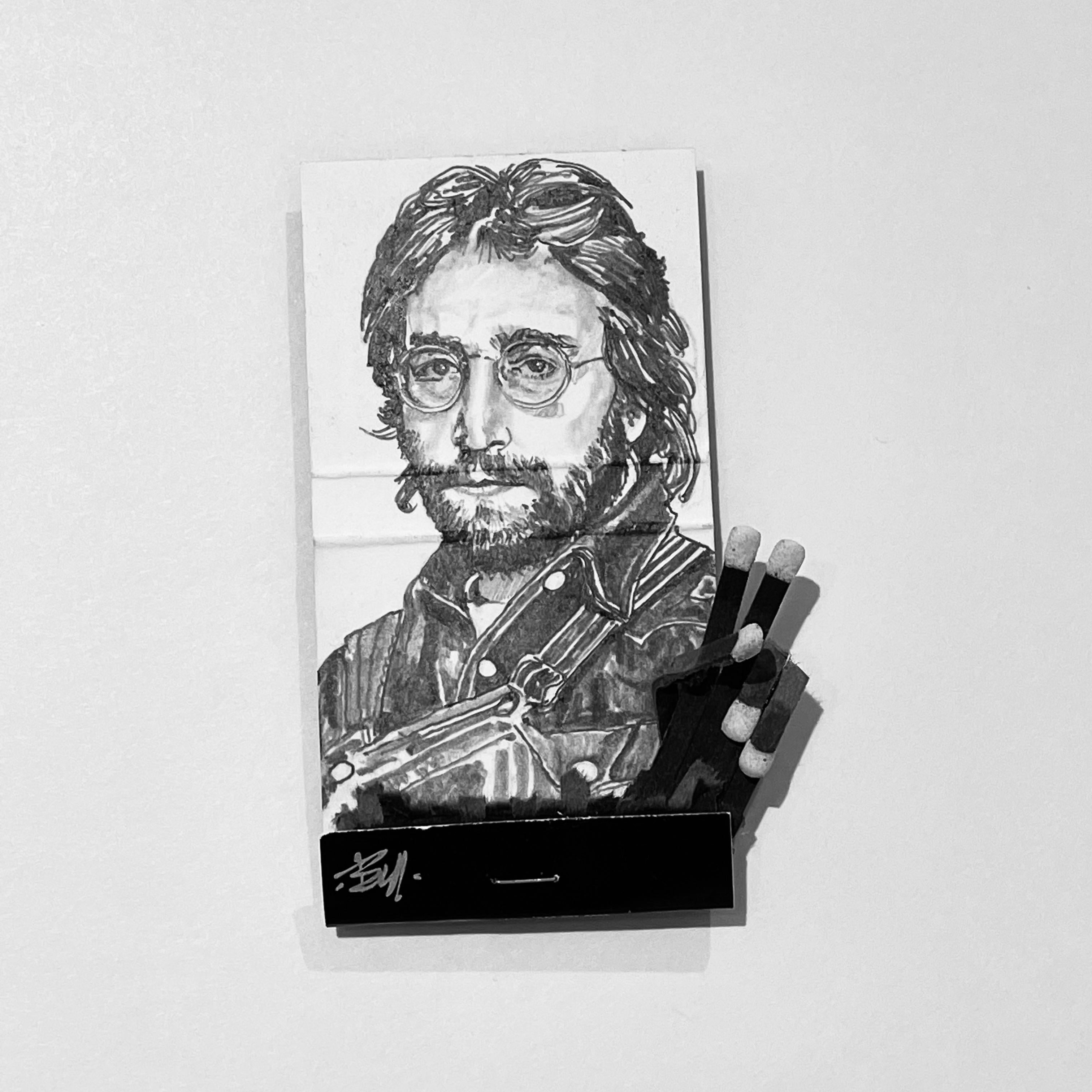 MB visual Portrait - John Lennon - figurative black and white portrait pencil drawing on matchbox