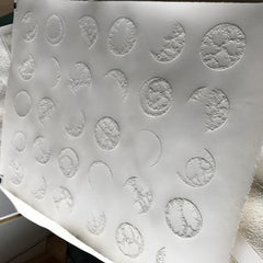 30 Moon Circles - intricate white 3D abstract geometric pulled paper drawing 
