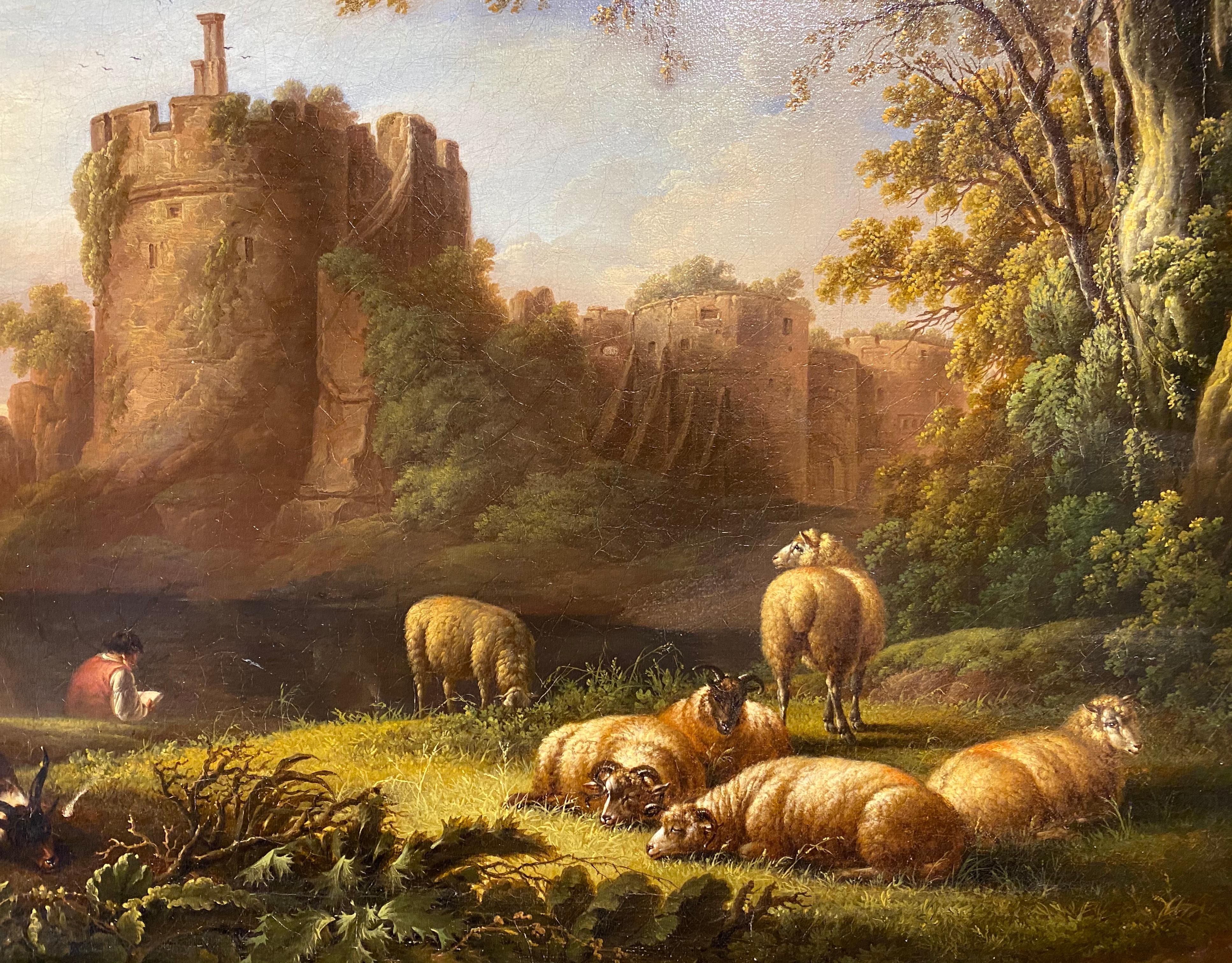 A young poet seated in a landscape before ruins, with sheep and goats resting - Brown Landscape Painting by Charles Towne