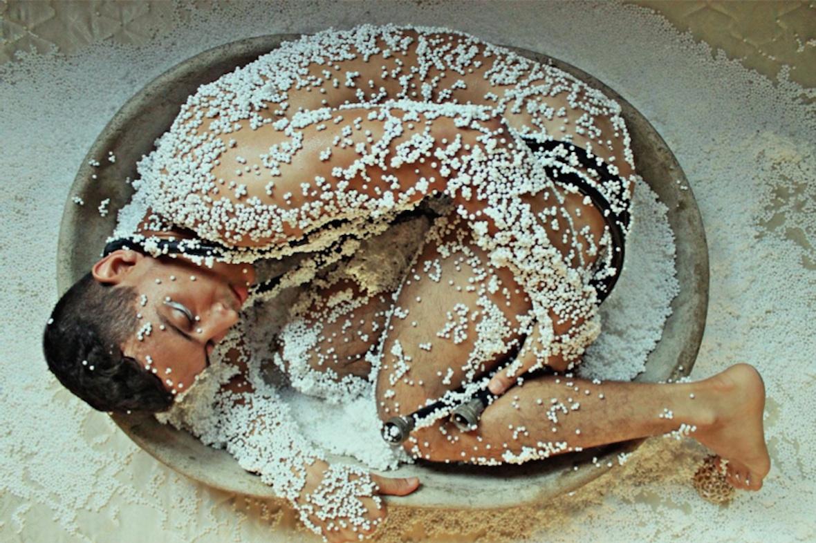 Jose Sierra Nude Photograph - Ovulando En Plástico.  Limited Edition Nude Self Portrait Color Photograph