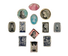 Set of 12 Plates. From the In Light of Her Series. Porcelain Wall Sculpture