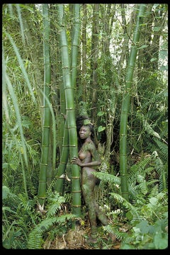 Women and Trees I. Female nude in a landscape. Color photograph