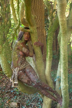 Women and Trees III. Female nude in a landscape. Color photograph