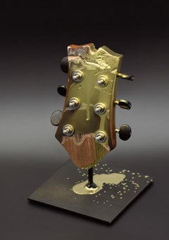 Long live the king. Color photograph of a assembled guitars body Sculpture