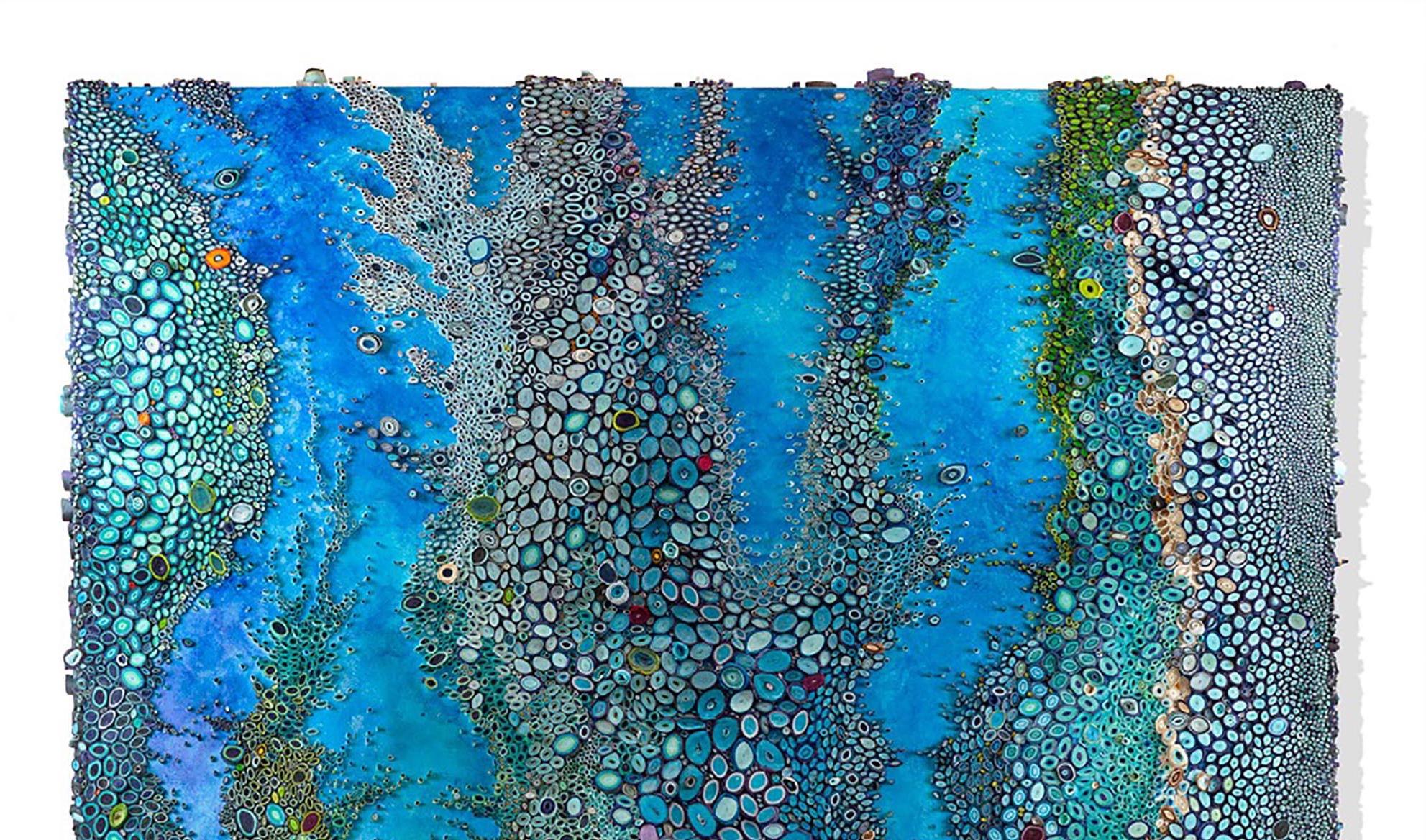 Mixed Media artist Amy Genser makes dimensional paper collages. This large scale bluel, textural, one-of-a-kind wall pieces embody movement and processes. She masterfully manipulates paper -- each piece being cut, rolled and stacked -- to mimic