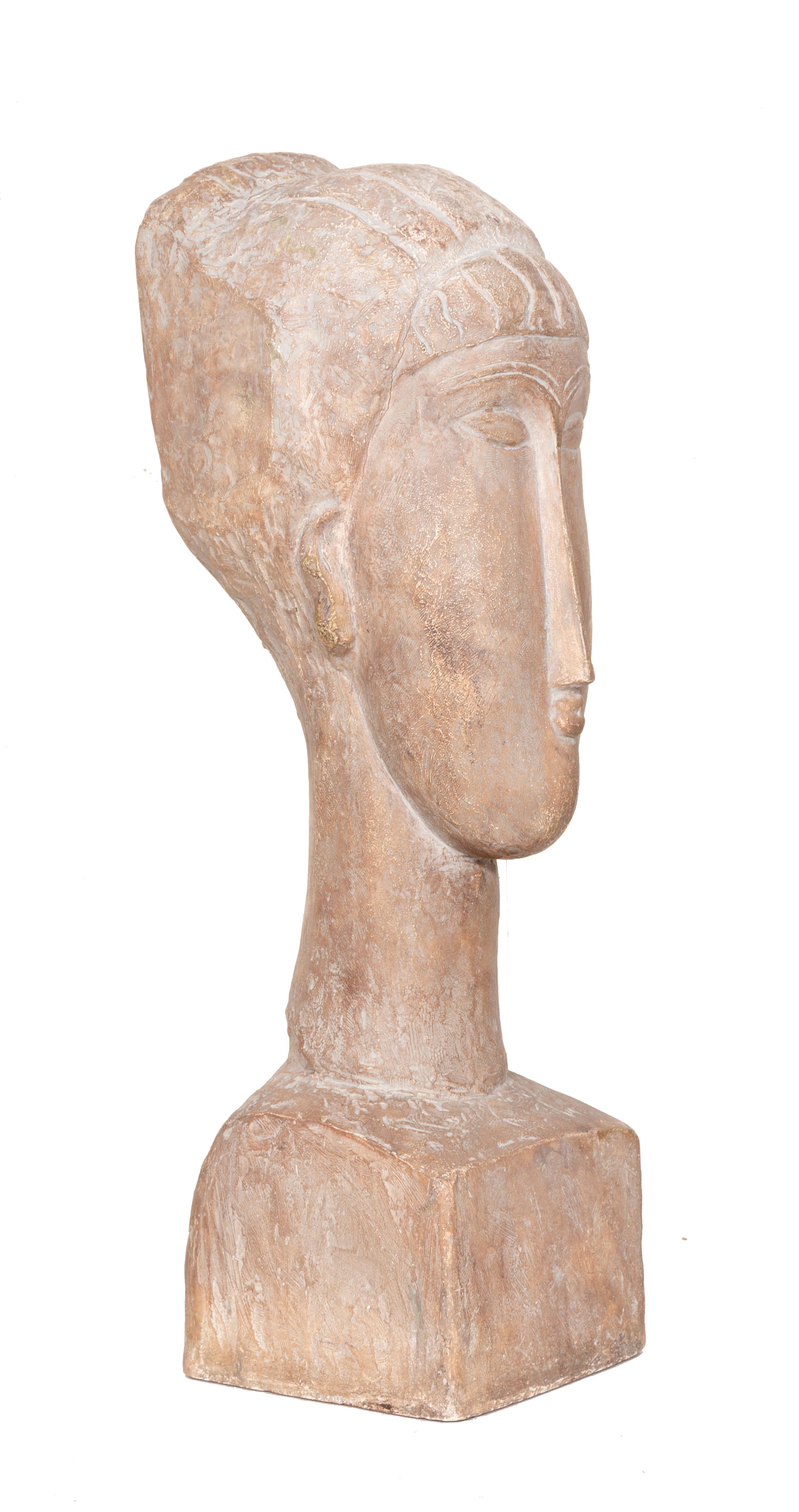 Tete de Femme after Modigliani, produced by Austin Productions in 1963. Austin Productions started in Brooklyn in 1952 and began manufacturing reproductions of classic sculptures by popular artists. Known for their high-quality pieces that are